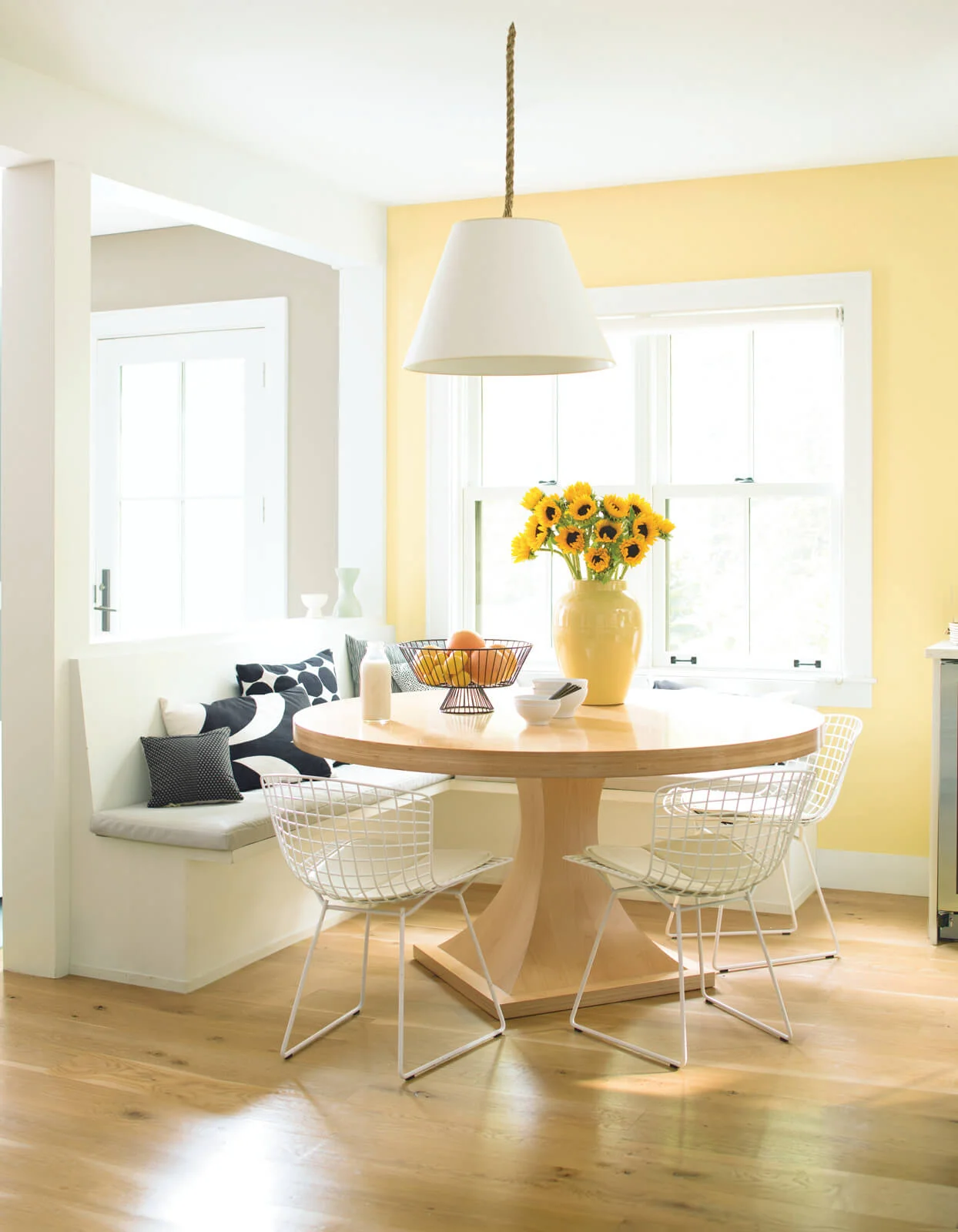 Pale_Yellow_Kitchen_with_Vase_of_Sunflowers.jpg