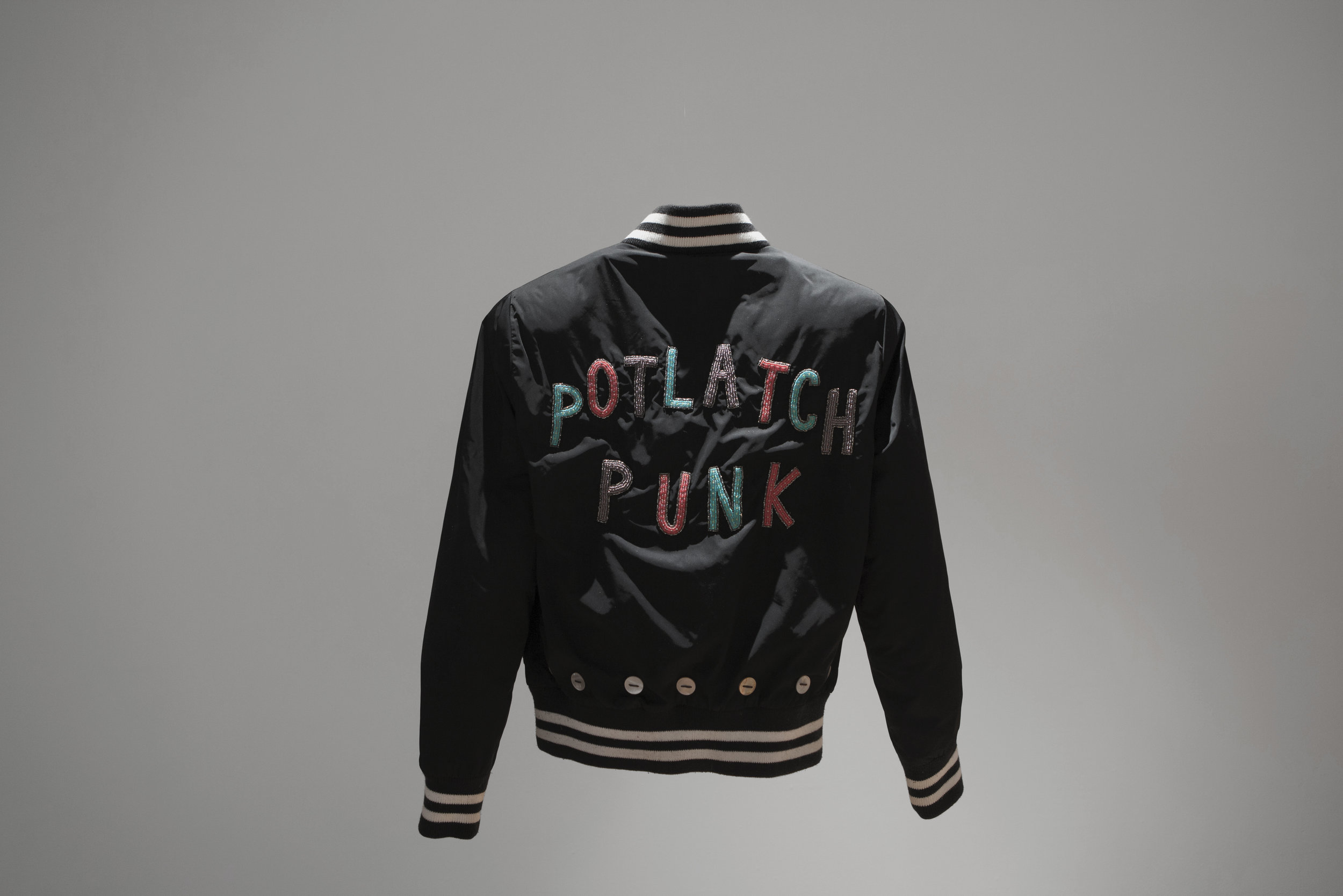   Potlatch Punk , beading and buttons on small sports jacket, 2016 