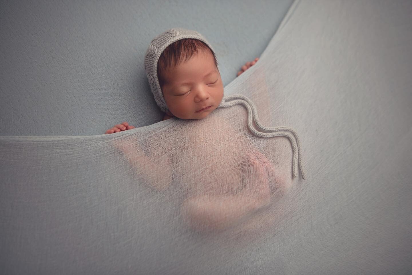 Sneak peak of baby Faisal. Bonnet by @littleblessingphotoprops wrap by @redowlphotoprops