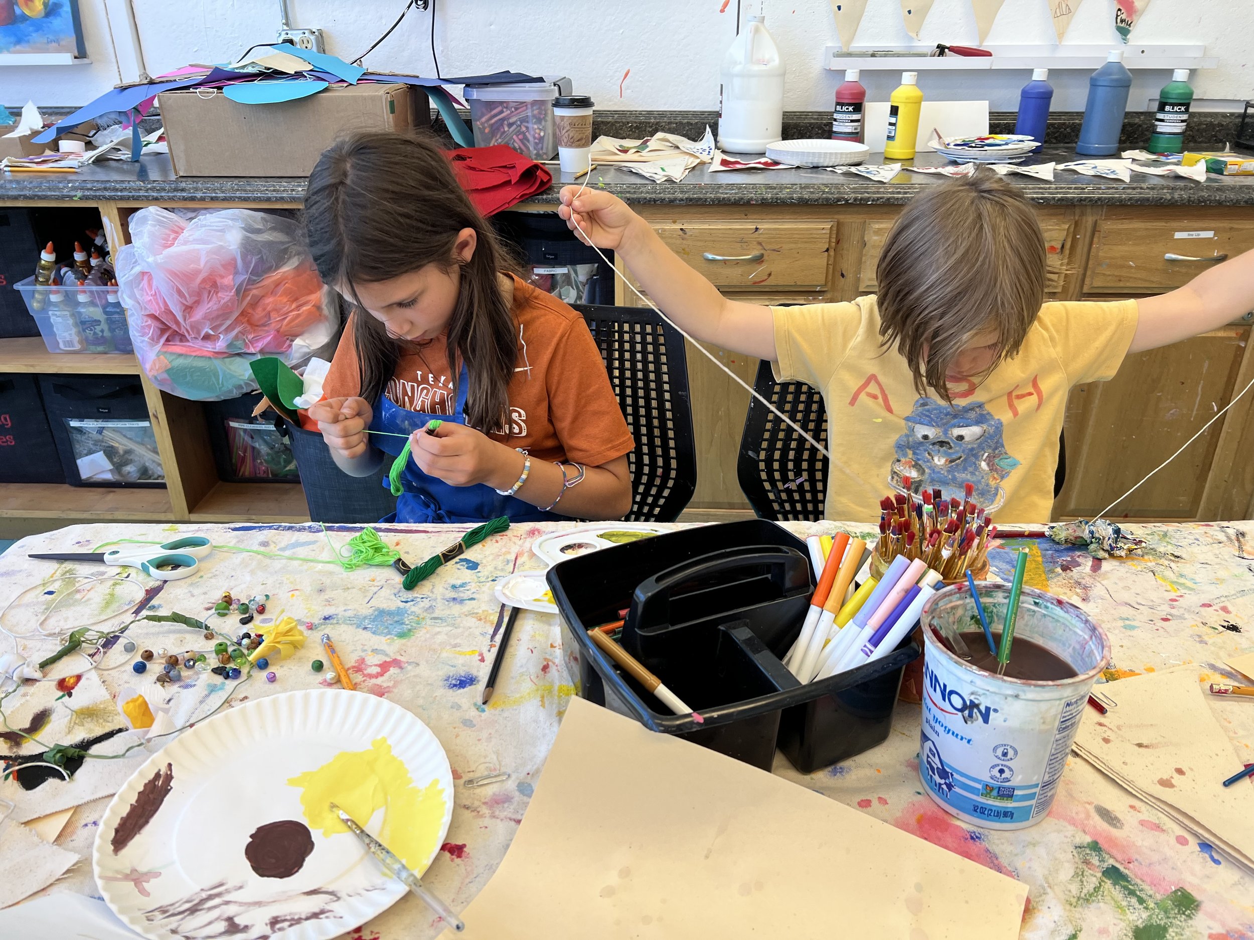 Two children with string.JPG