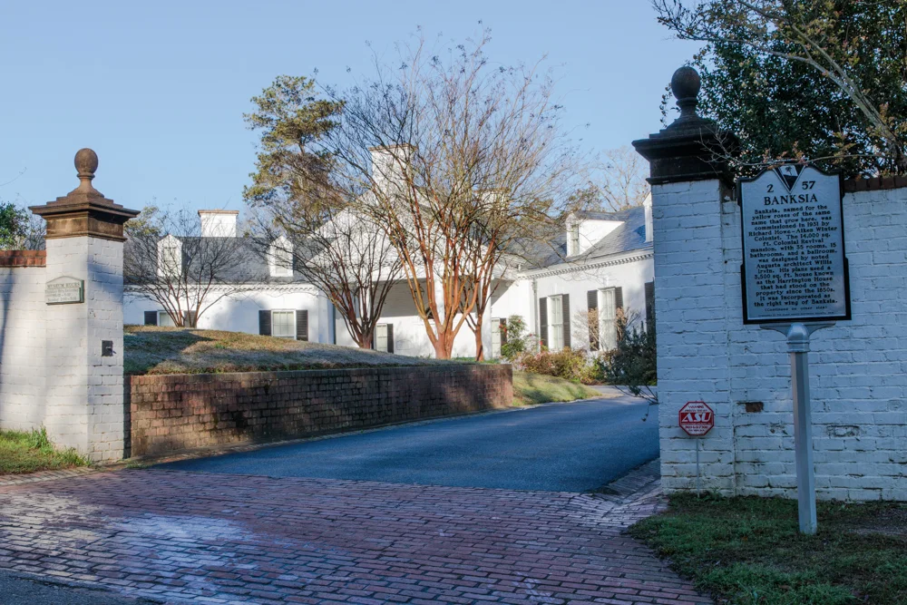 5 minutes further along after another turn to the East is found the Aiken County Historical Society Museum, a 14,500 square foot former grand house called Banksia.