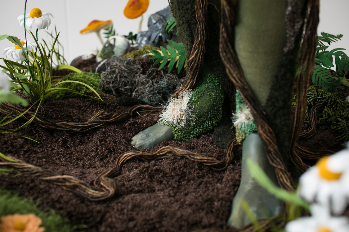 3D printed feet with hand embroidered moss patches and wool yarn roots. 