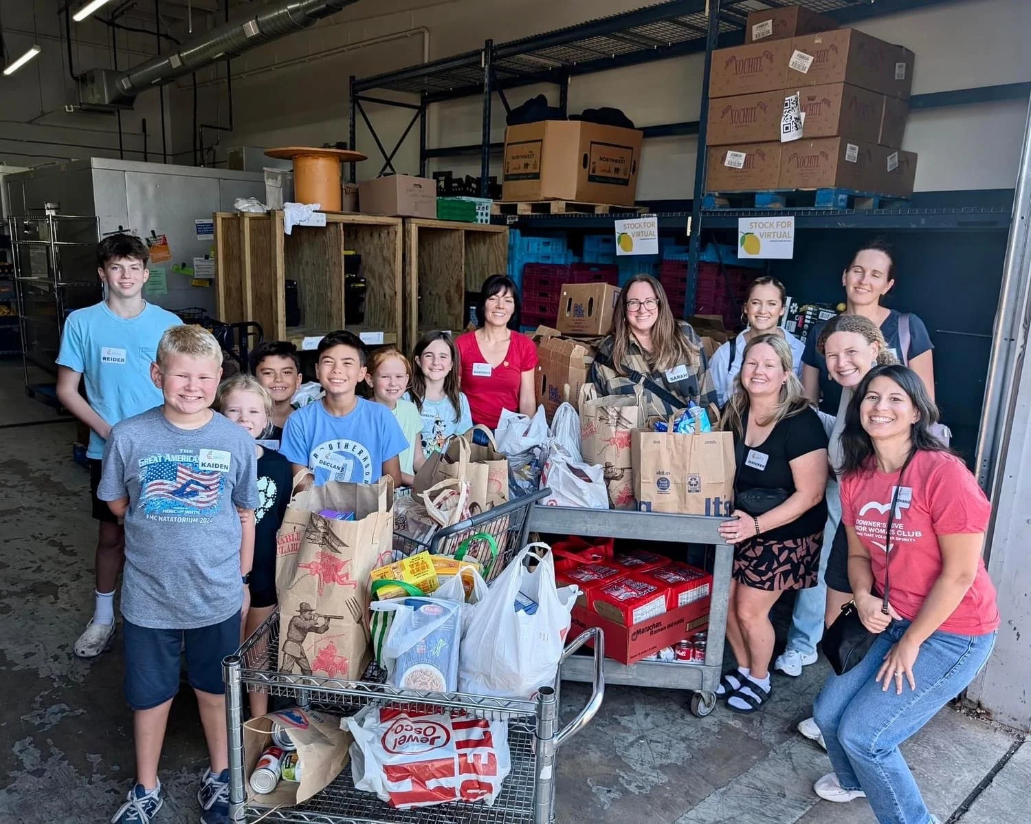  Juniors and their young families volunteering and delivering food collected at our 65th Anniversary Kick Off General Meeting to the West Suburban Food Pantry. 