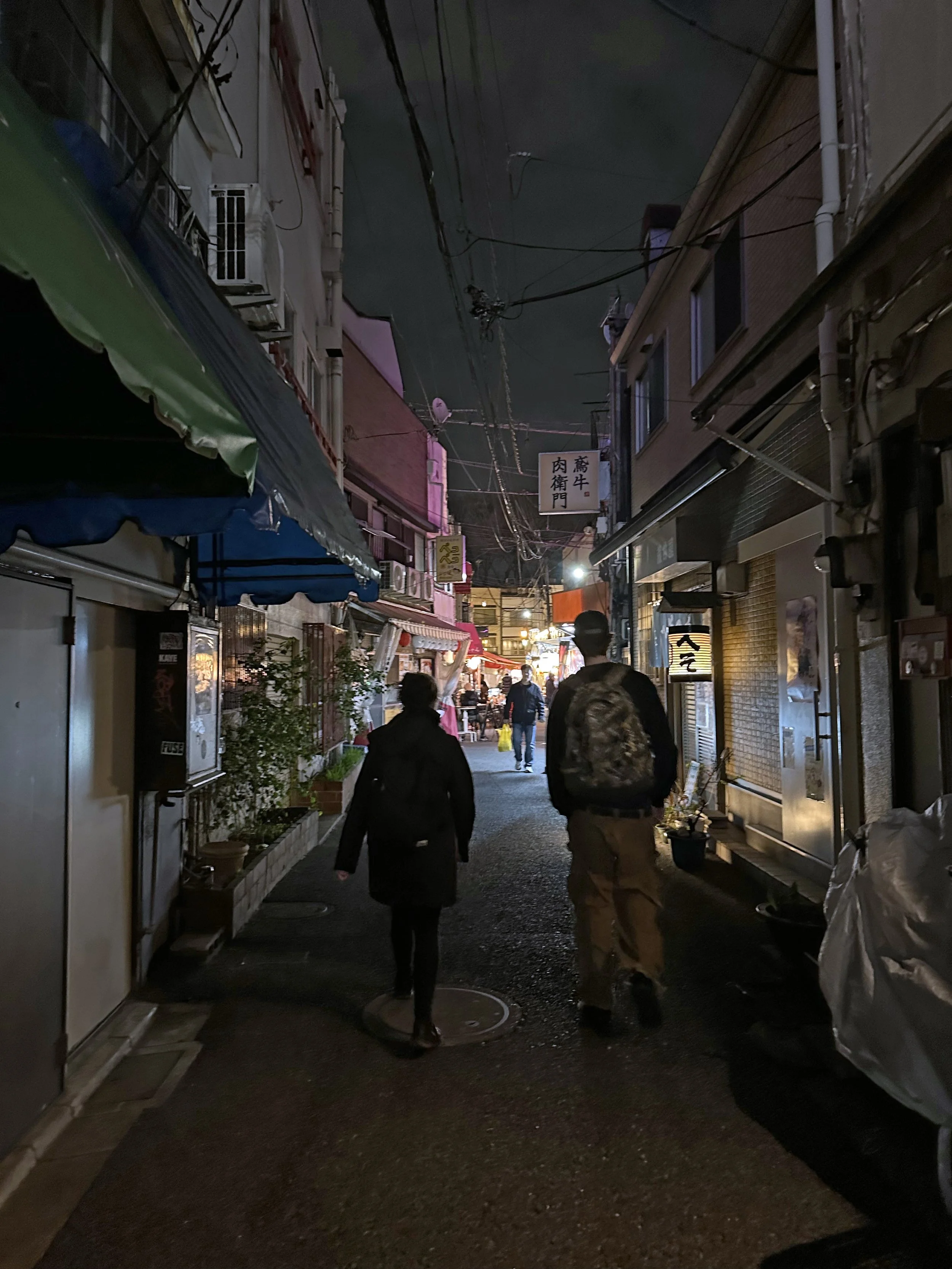  Two-thirds of our travelling trio, off in search of food. We were never disappointed in our search for chow! 