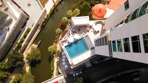 Aerial video footage of the Thompson Hotels swimming pool and surroundings.