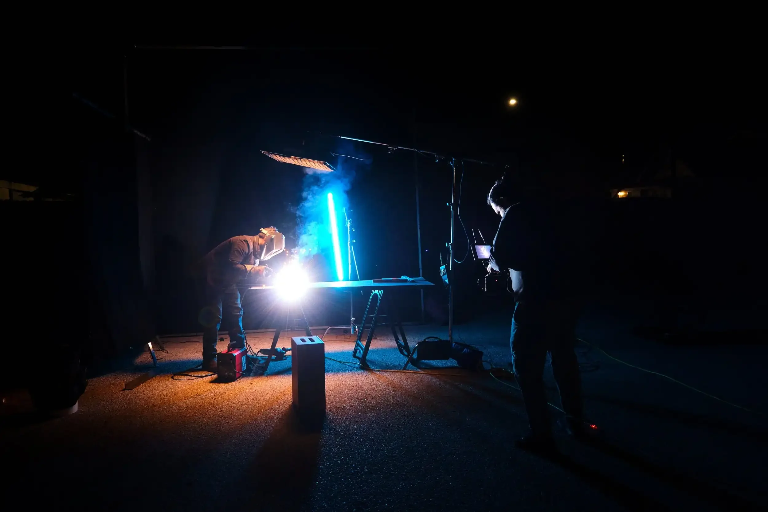 Encima Media production crew filming the welding process.