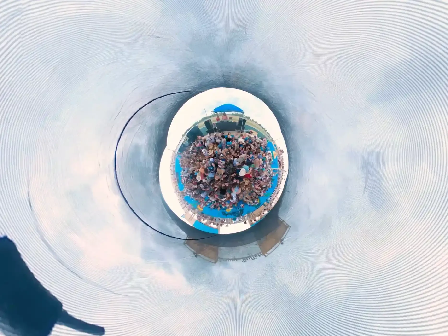 Energetic crowd cheering and enjoying the live music performance at the Chili Music Festival event.