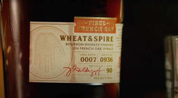 Oak & Eden bourbon whiskey bottle label and branding.