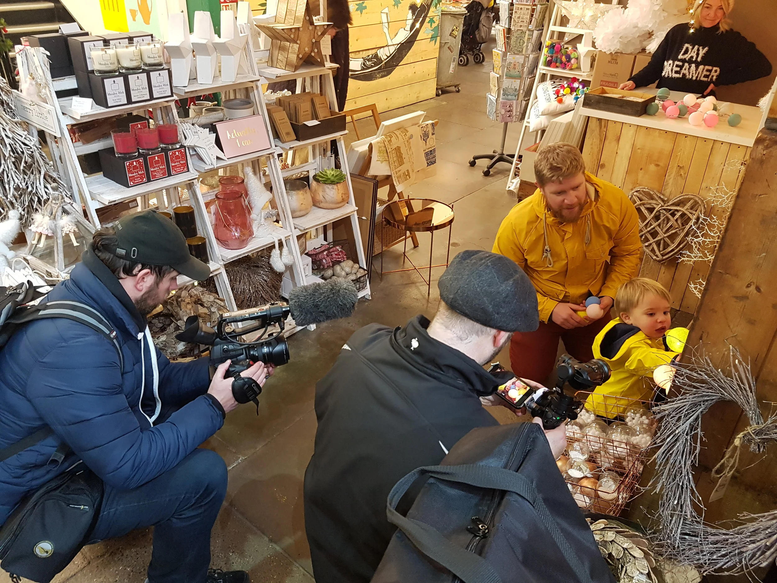  7Video filming a little boy Christmas shopping. 