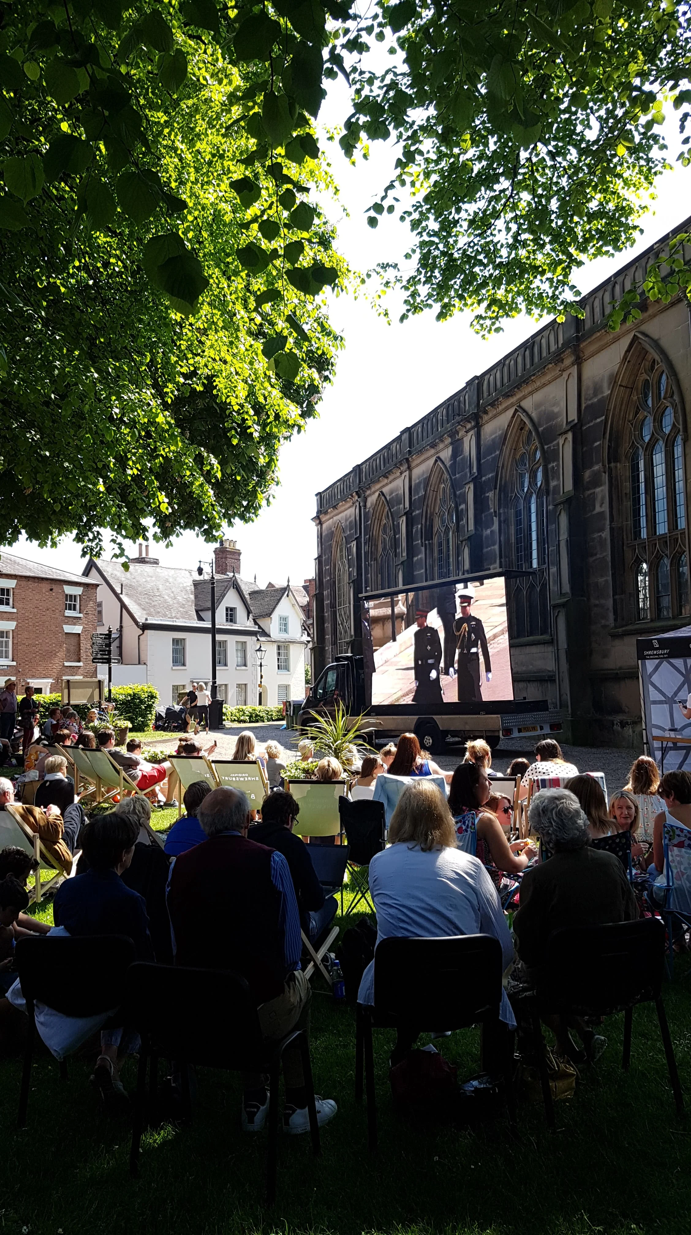  View over the audience watching the Royal Wedding on the big screen at St Alkmunds Church in Shrewsbury. 