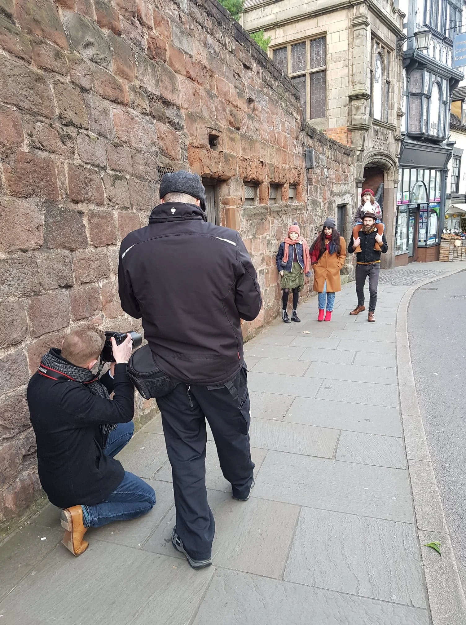  Pete Sims and Richard Wilkinson filming and photographing family on Castle Street in Shrewsbury. 