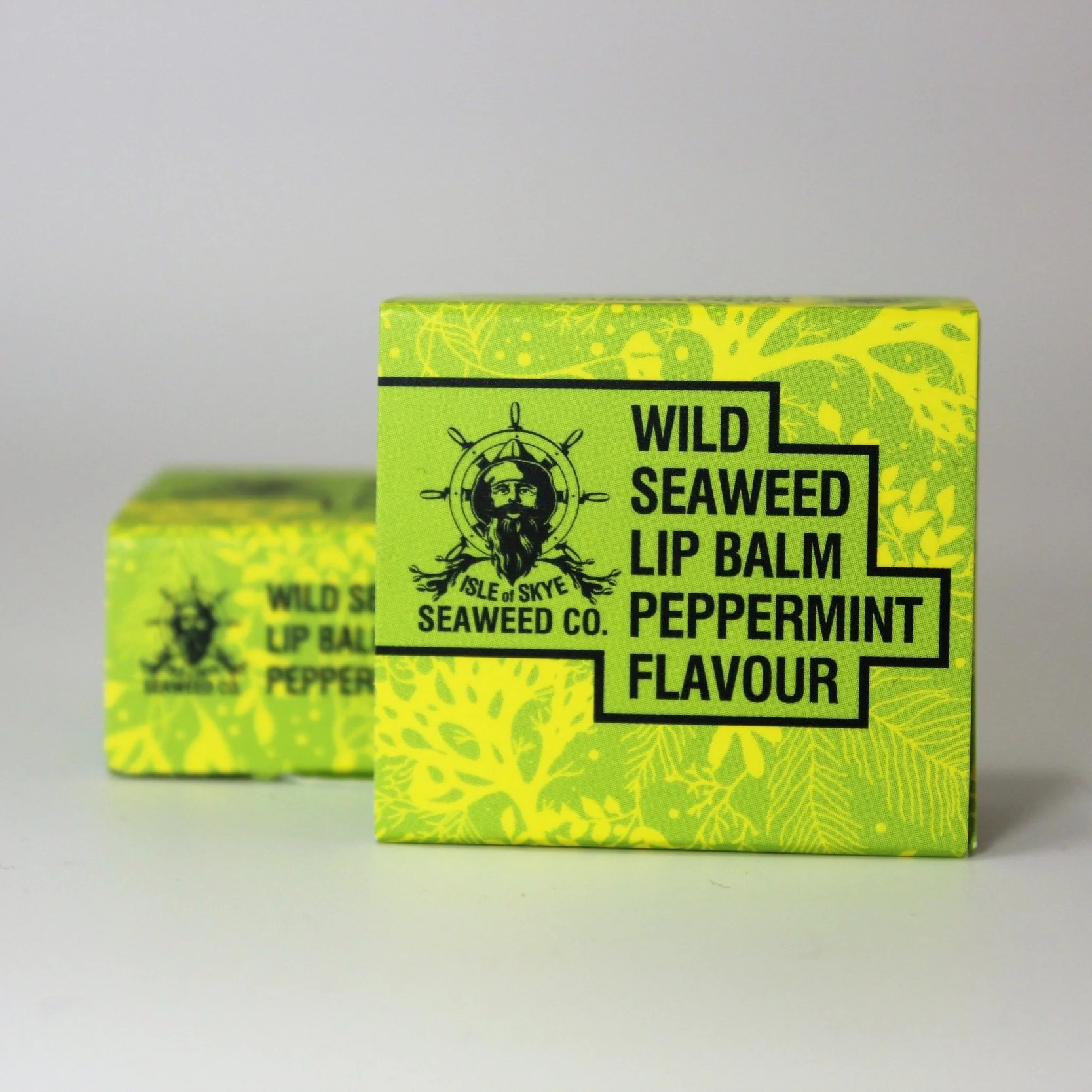 two lip balm tins