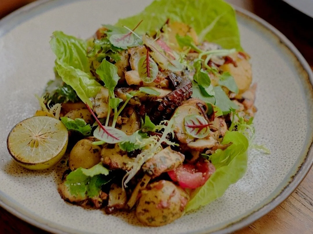 fresh salad with grilled octopus dish