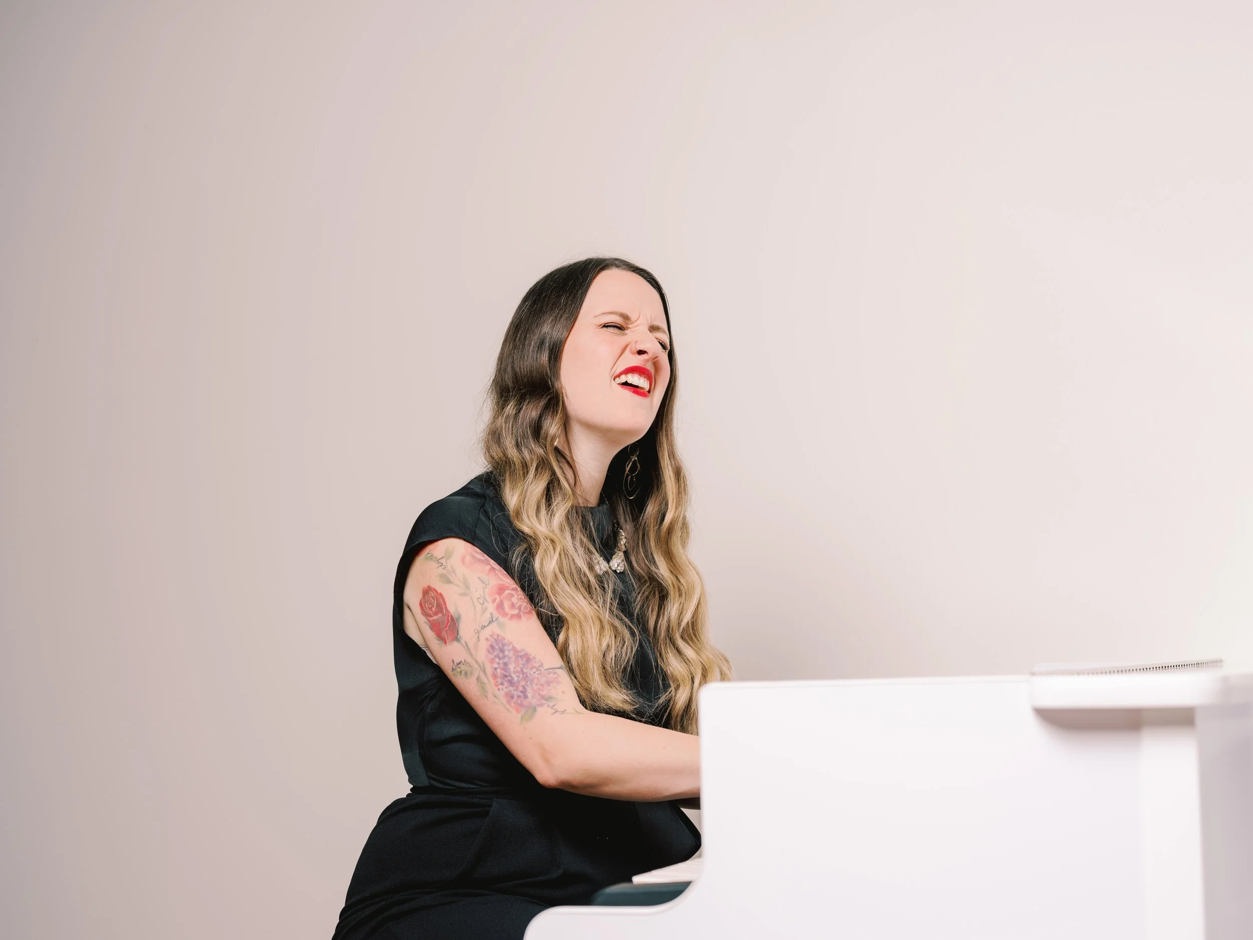 Singing at piano.jpeg