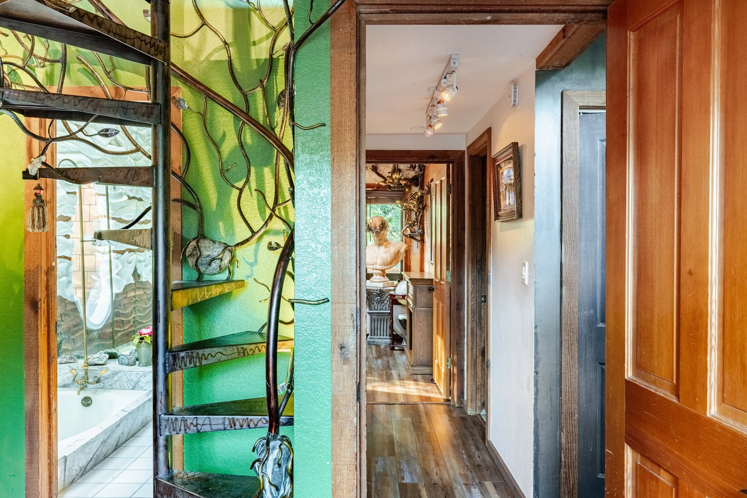 Iron spiral staircase hallway to library
