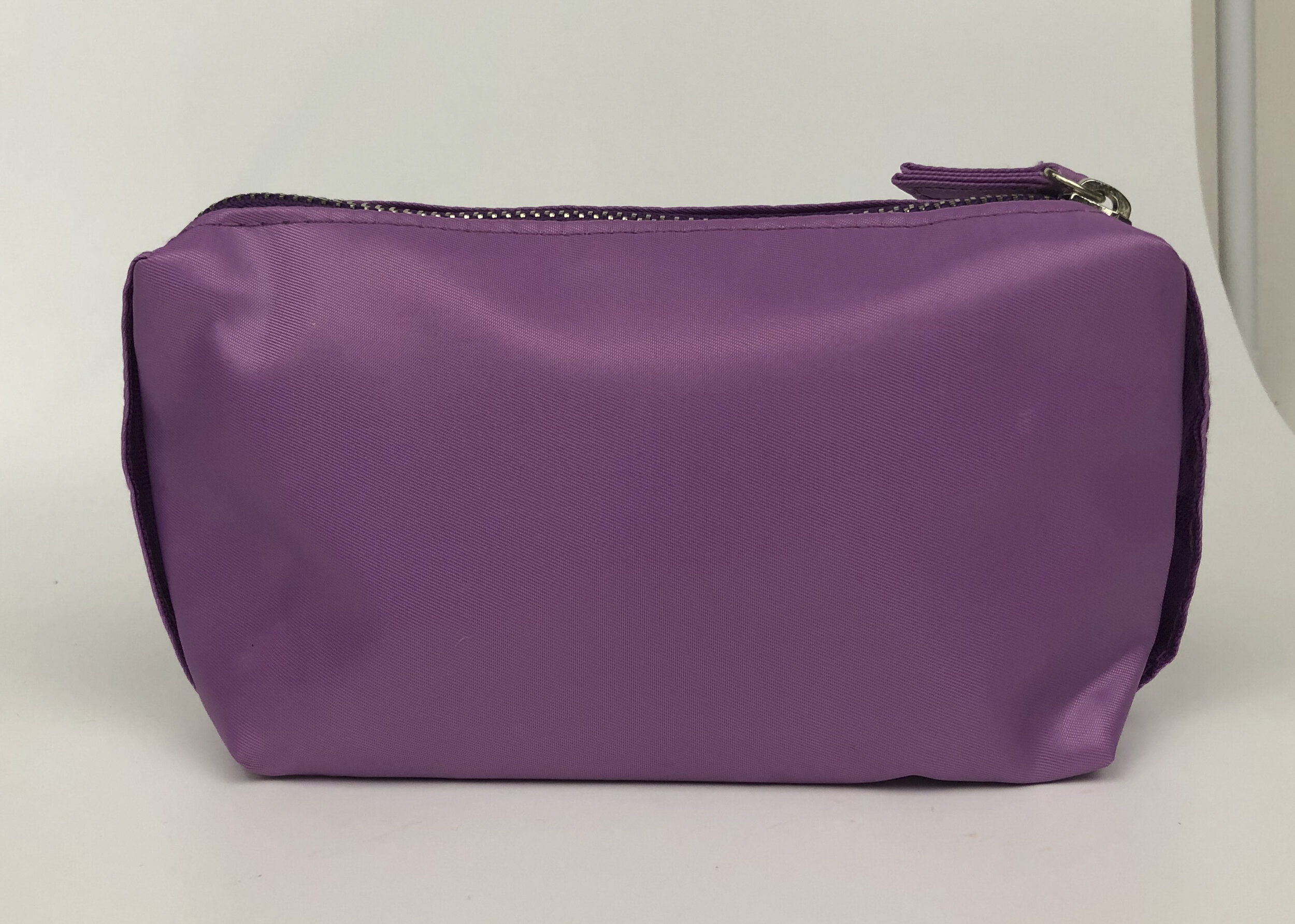 Purple makup bag-1a_MichelleTucker_Retouching.jpg