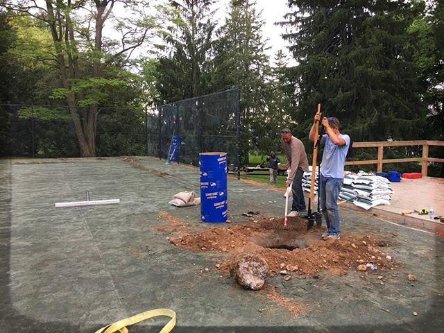 Weekly Project Feature: our crew working hard to replace tennis post sleeves, on a private HarTru Clay court in Keswick. This court now has a fresh new look for the summer season! #tennis #job