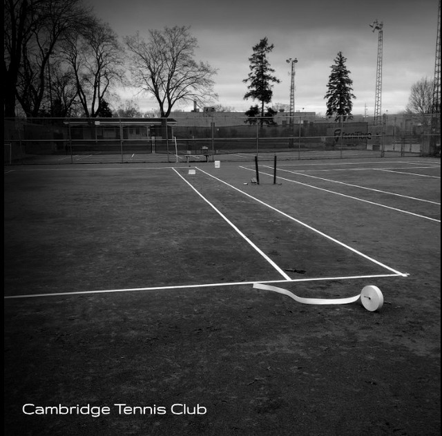 Every year we do Spring Maintenance at Cambridge Tennis Club. Here's a black &amp; white flashback from last year when we nailed new lines down! #tennis #job #blackandwhite