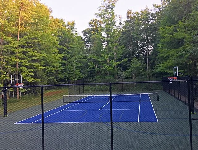 Job of the week: Private court in Innisfil, Ontario
Our team installed the basketball hoops, colour coated it, and painted new lines to transform this former tennis court into a multifaceted sport court!  We also had the surface paved &amp; fencing a