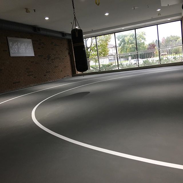 We just finished this amazing restoration project. This two lane rubber running track was a dated Blue and Red, after applying two coats of Black Acrylic Resurfacer to smooth it out we applied the new Cape Grey Acrylic Paint! New sleek lines made thi