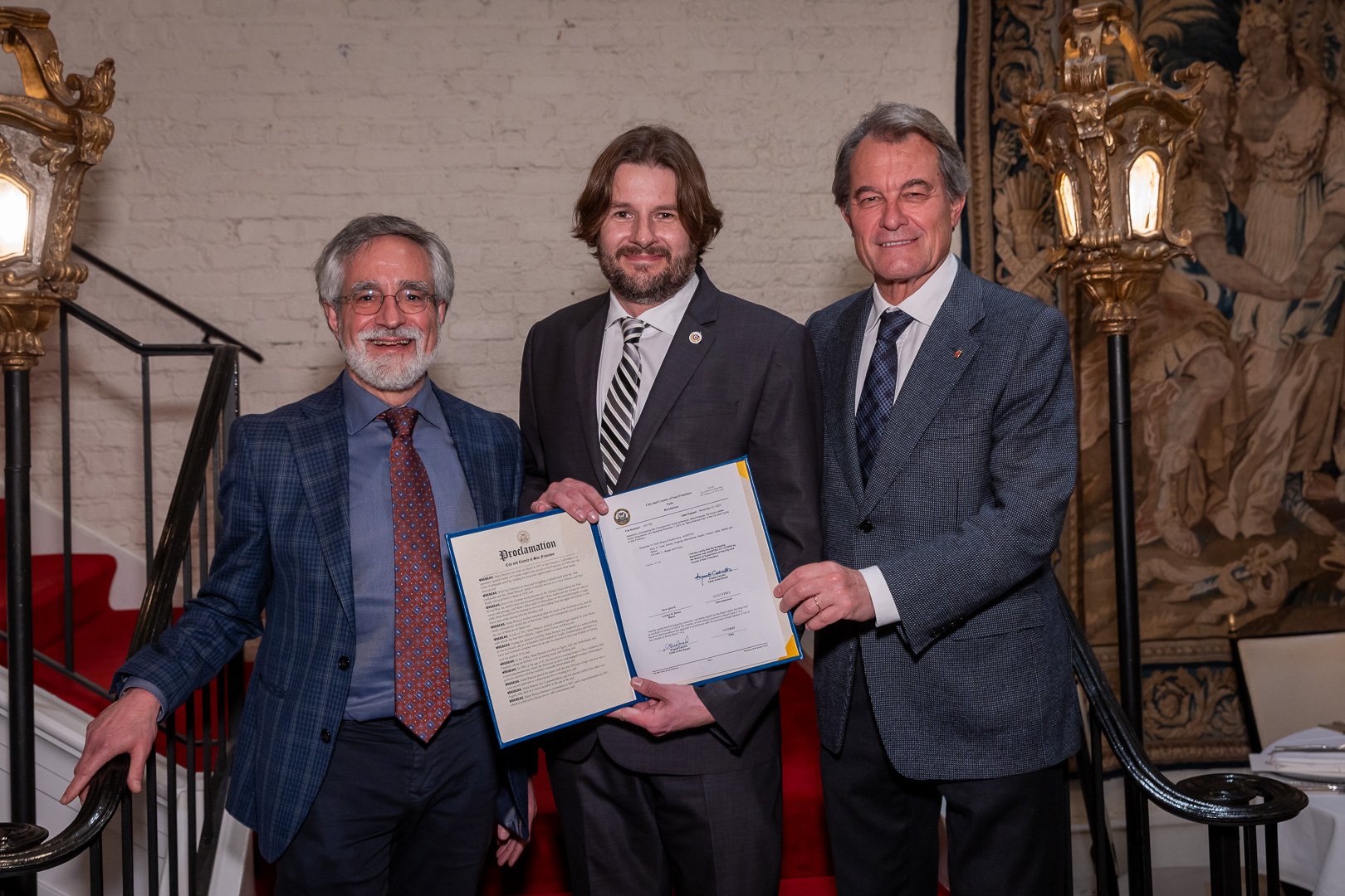 SF Board of Supervisors President Aaron Peskin (left) Presenting an Official Resolution commending Maria Branyas