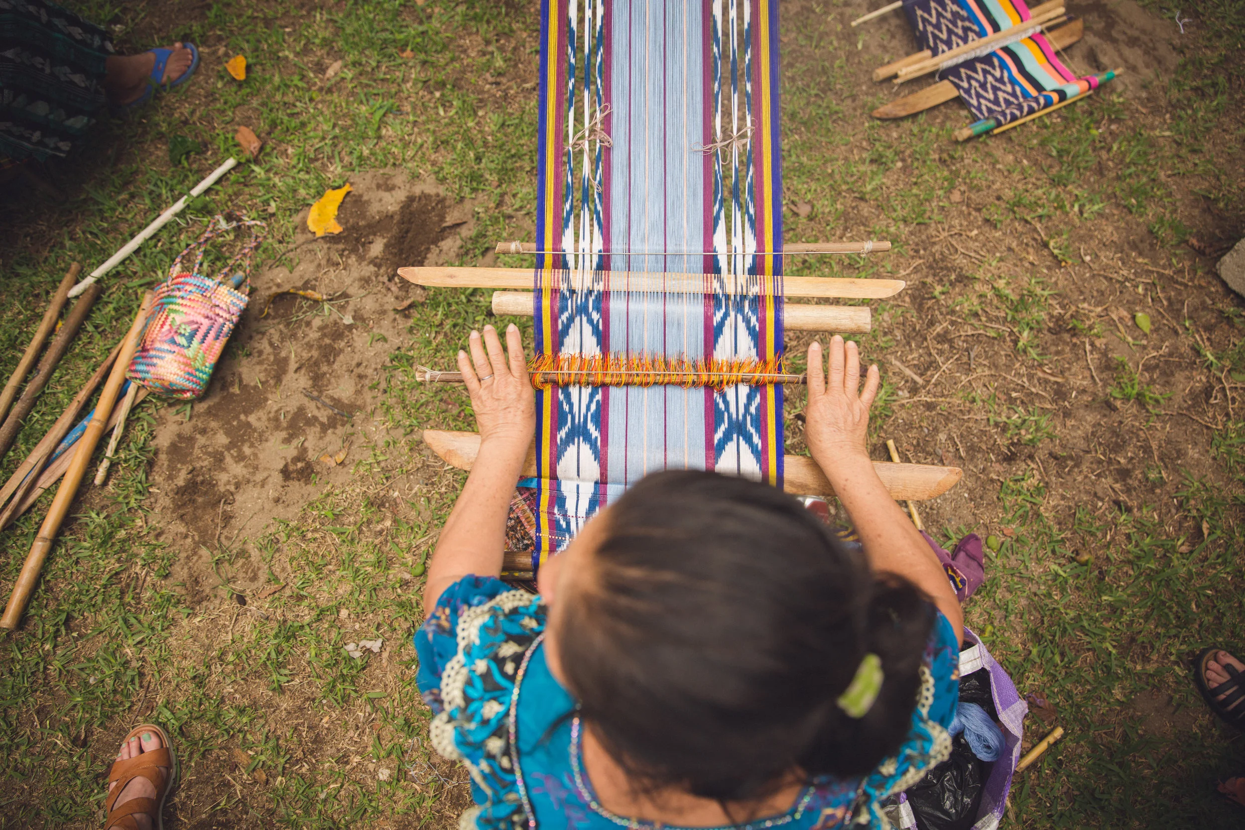 A Noonday artisan weaving in Guatemala NOONDAY COLLECTION