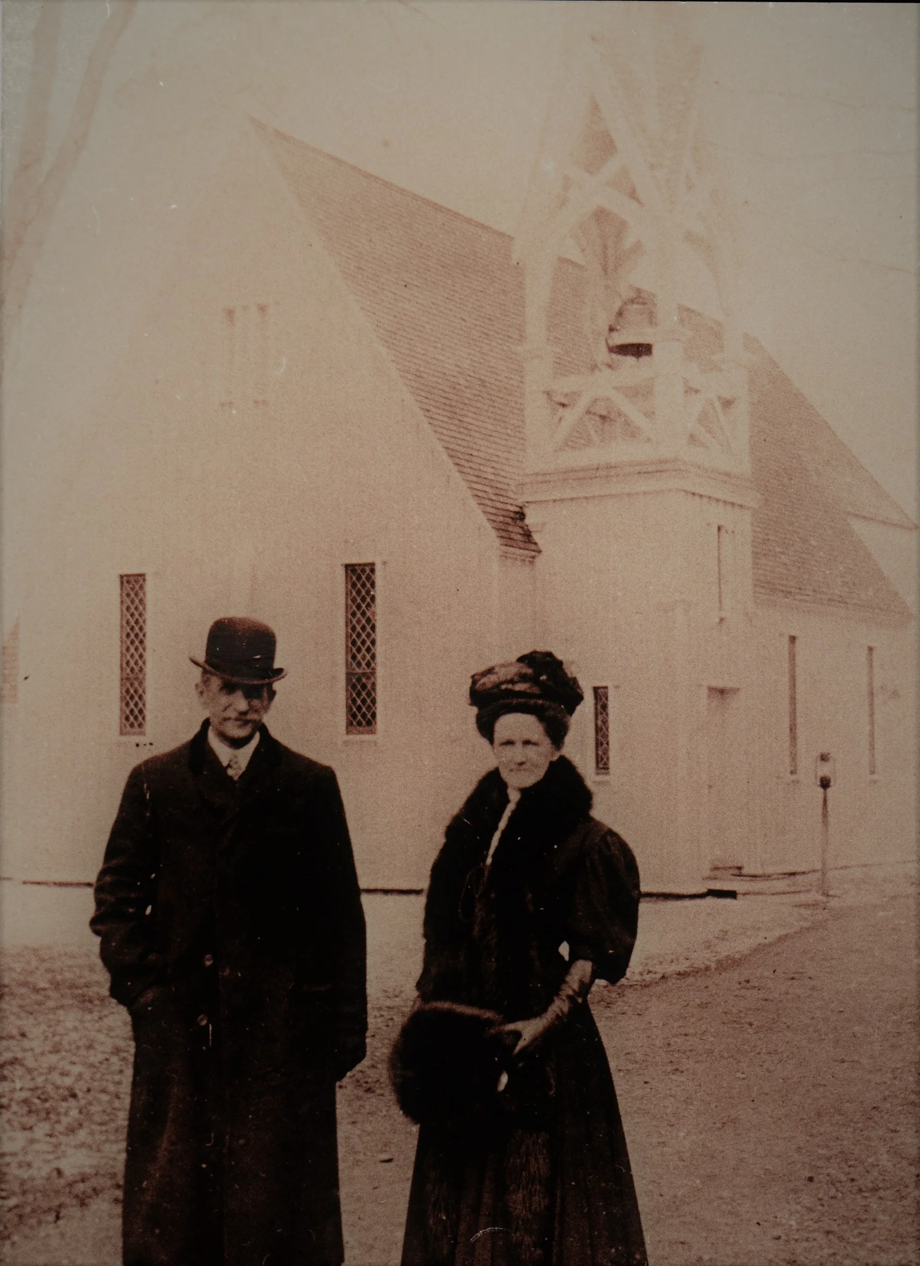 John and Grace Duxbury in front of the Church of Regeneration