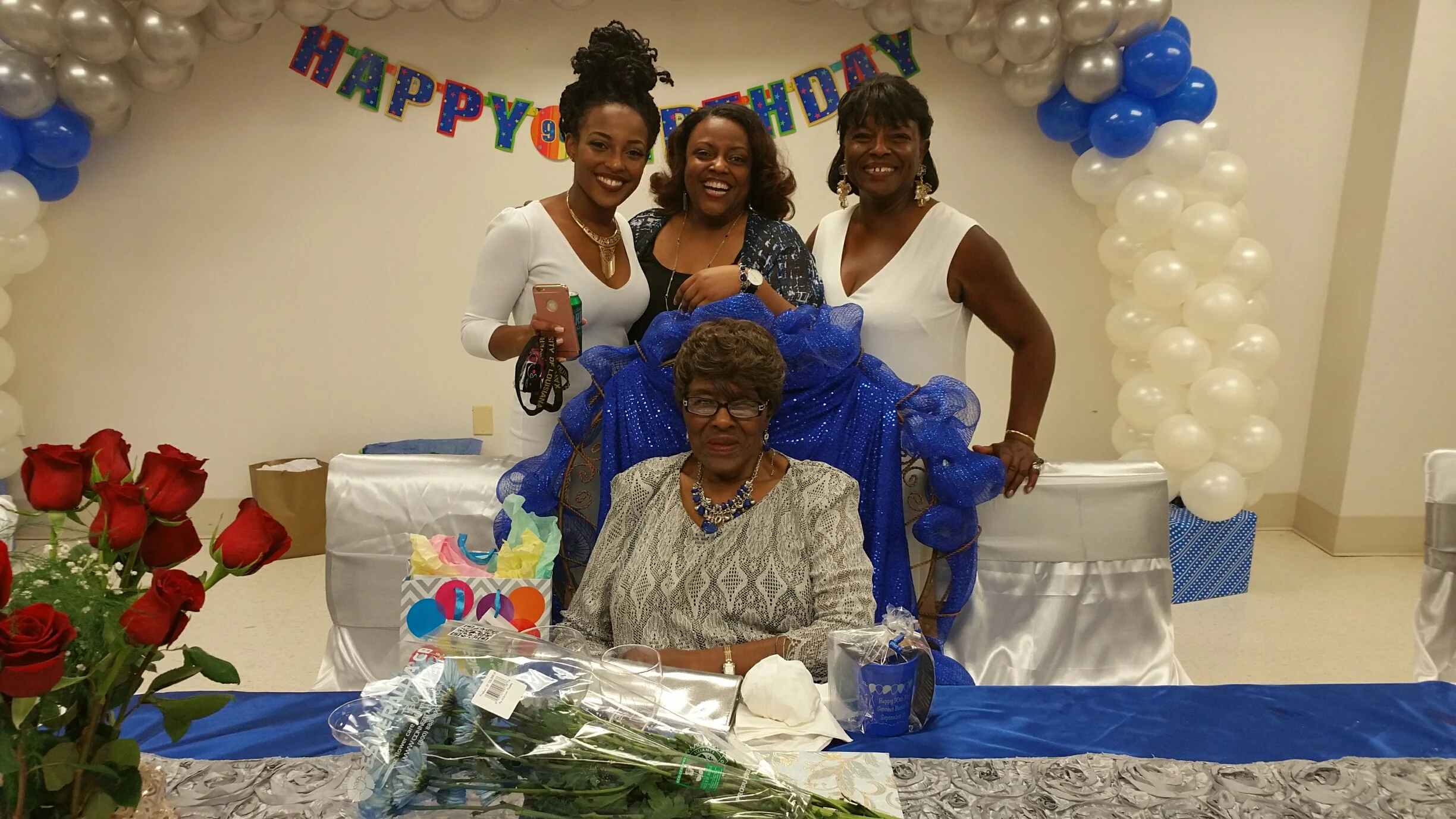 Four generations together celebrating the 90th birthday of Mrs. Gennive Bazile Treaudo (seated). Standing L-R: Bria Rene Wroten, Deana Catrice Bell, Carolyn Treaudo Bell.