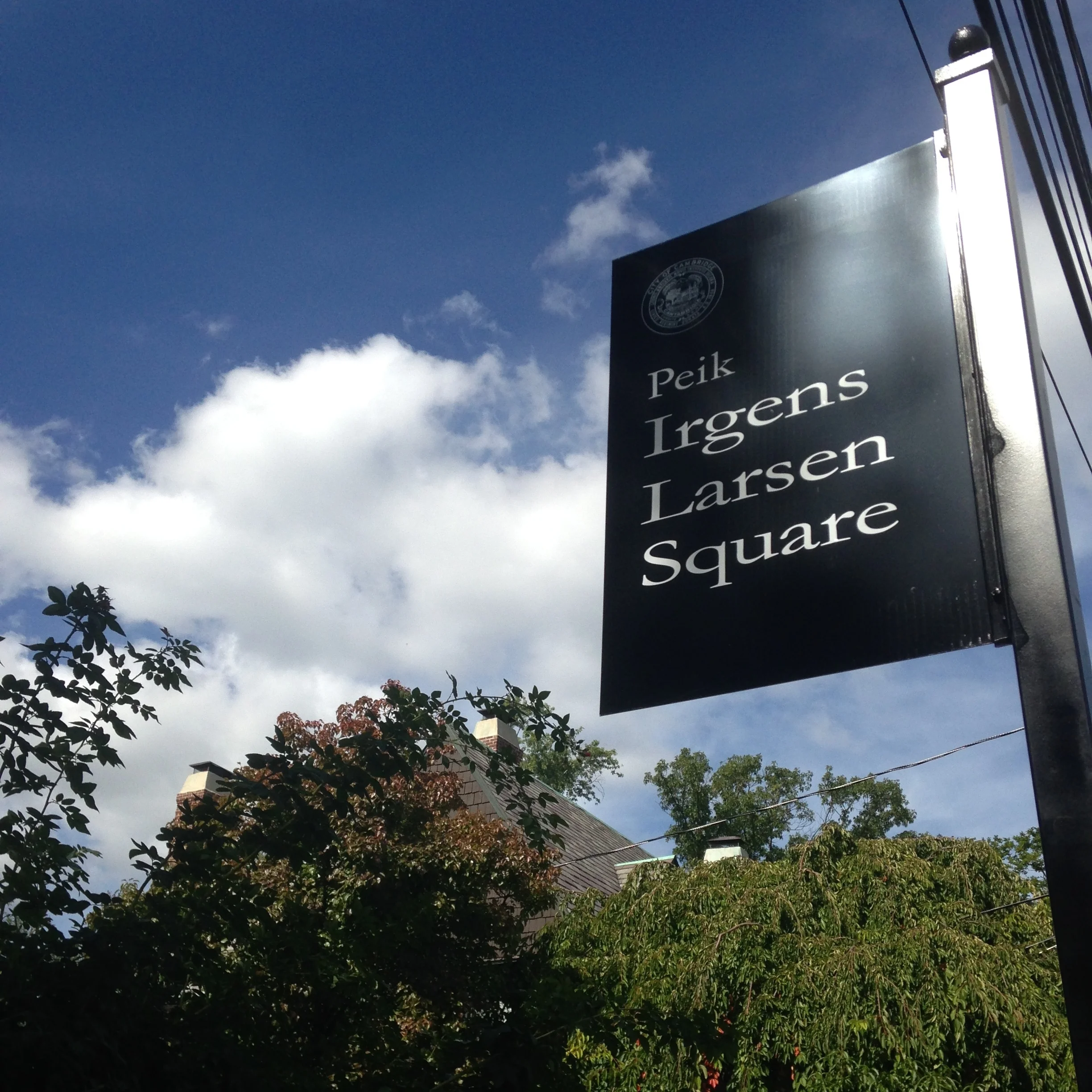 Peik Irgens Larsen Square ~ circa 2015 Memorial given by the city of Cambridge, MA. Stands at the corner of our childhood home, our childhood home in the background.