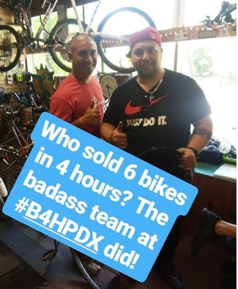 Picture of Tino standing next to childhood friend Frank. Text on picture reads: Who sold 6 bikes in 4 hours? The badass team at #B4HPDX did!
