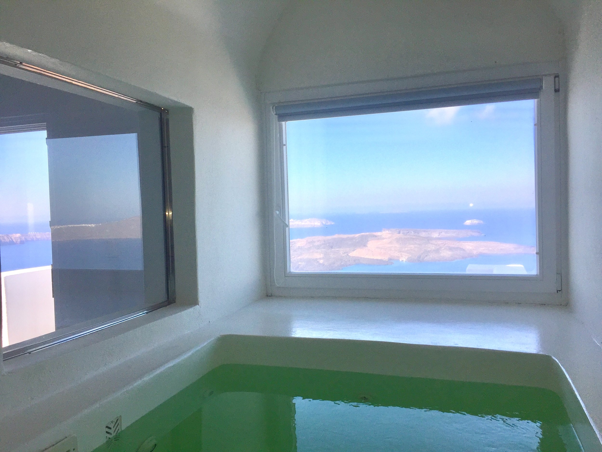Devi Ohira Santorini Greece Imerovigli Oia Caipirinha Residence indoor hot tub.jpeg