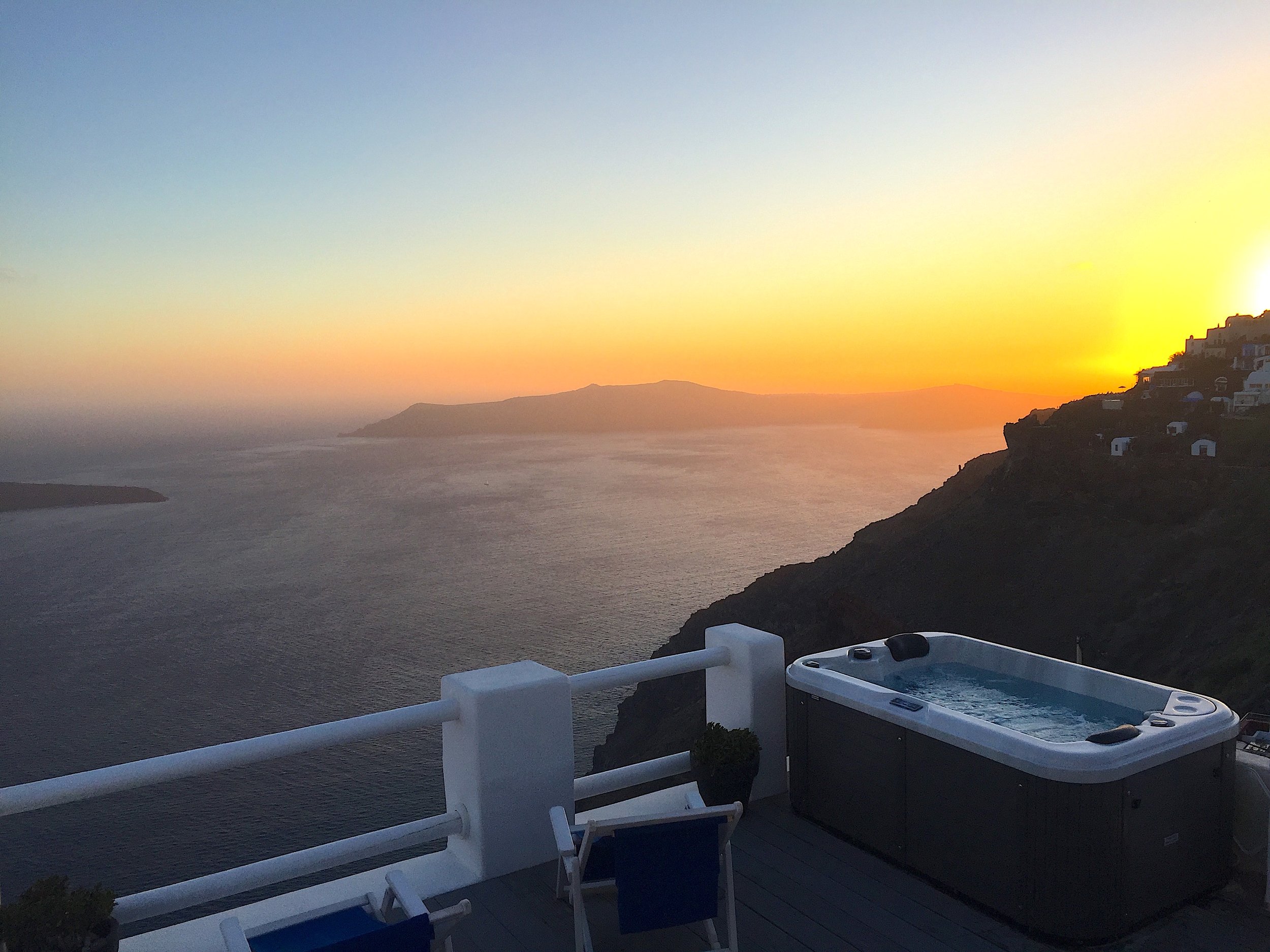 Devi Ohira Santorini Greece Imerovigli Oia hot tub outdoor view sunset.JPG