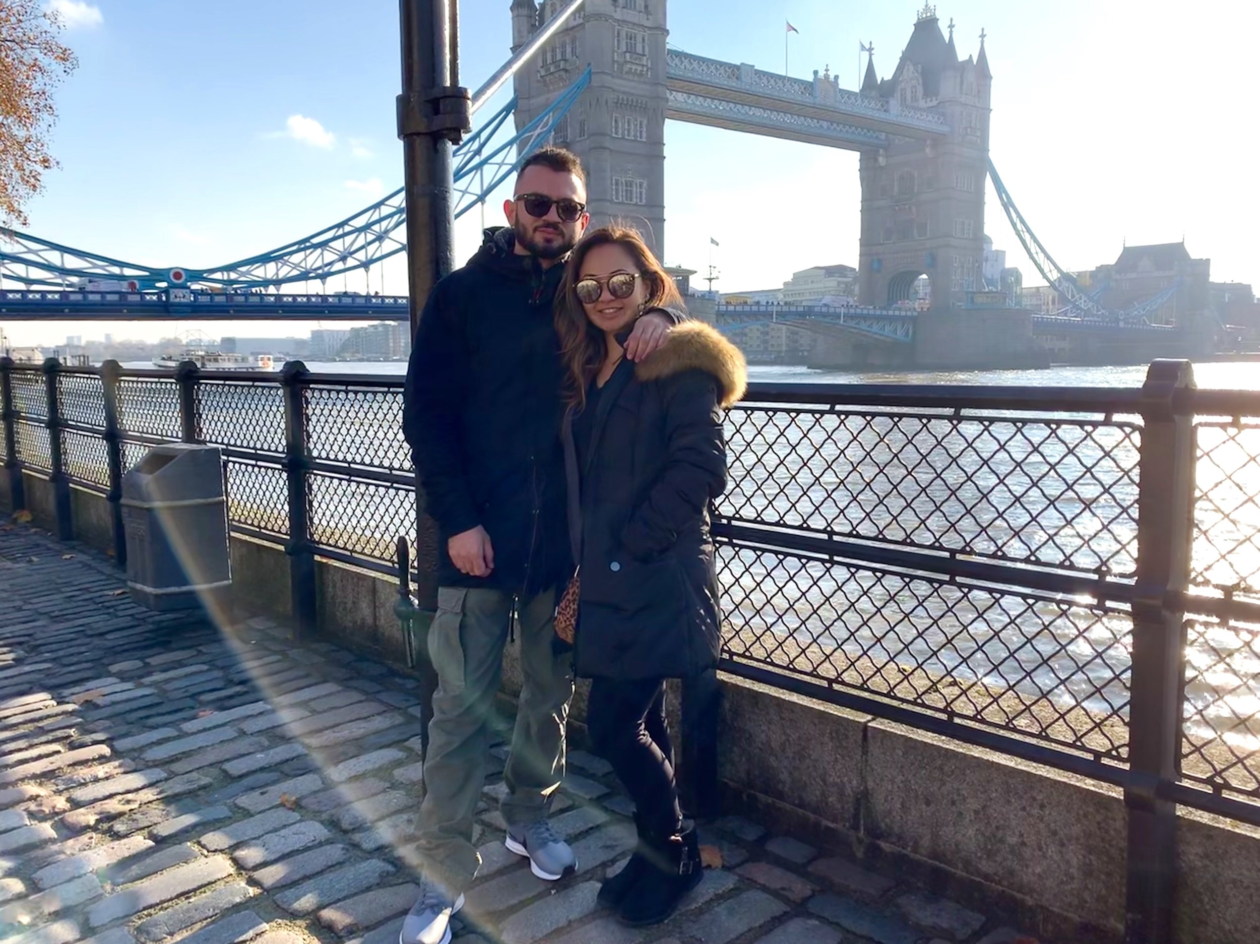 Devi Ohira River Thames London Tower Bridge travel couple.JPG
