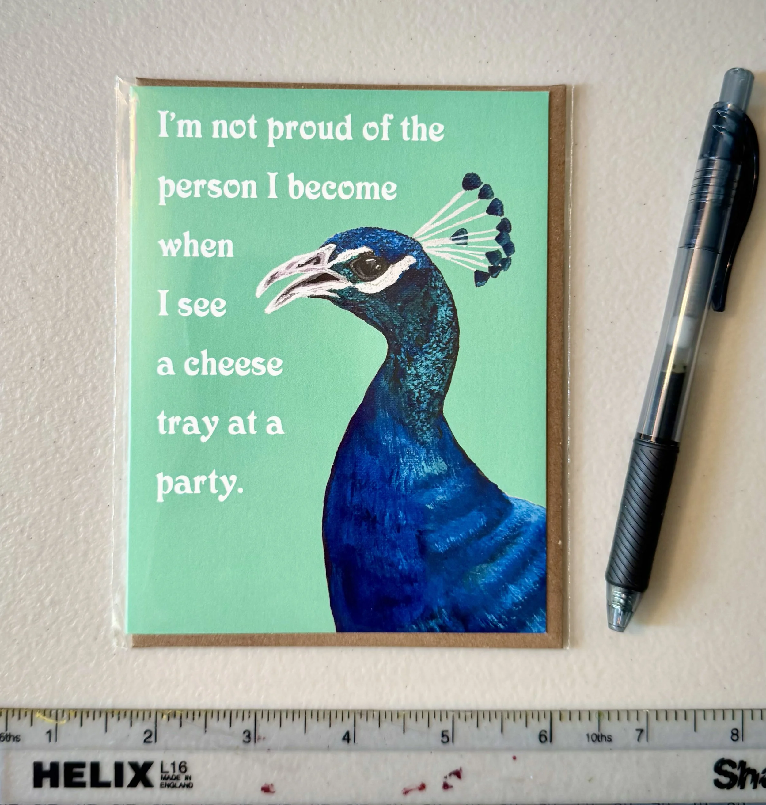 peacock_cheesetray_sleeved.jpg