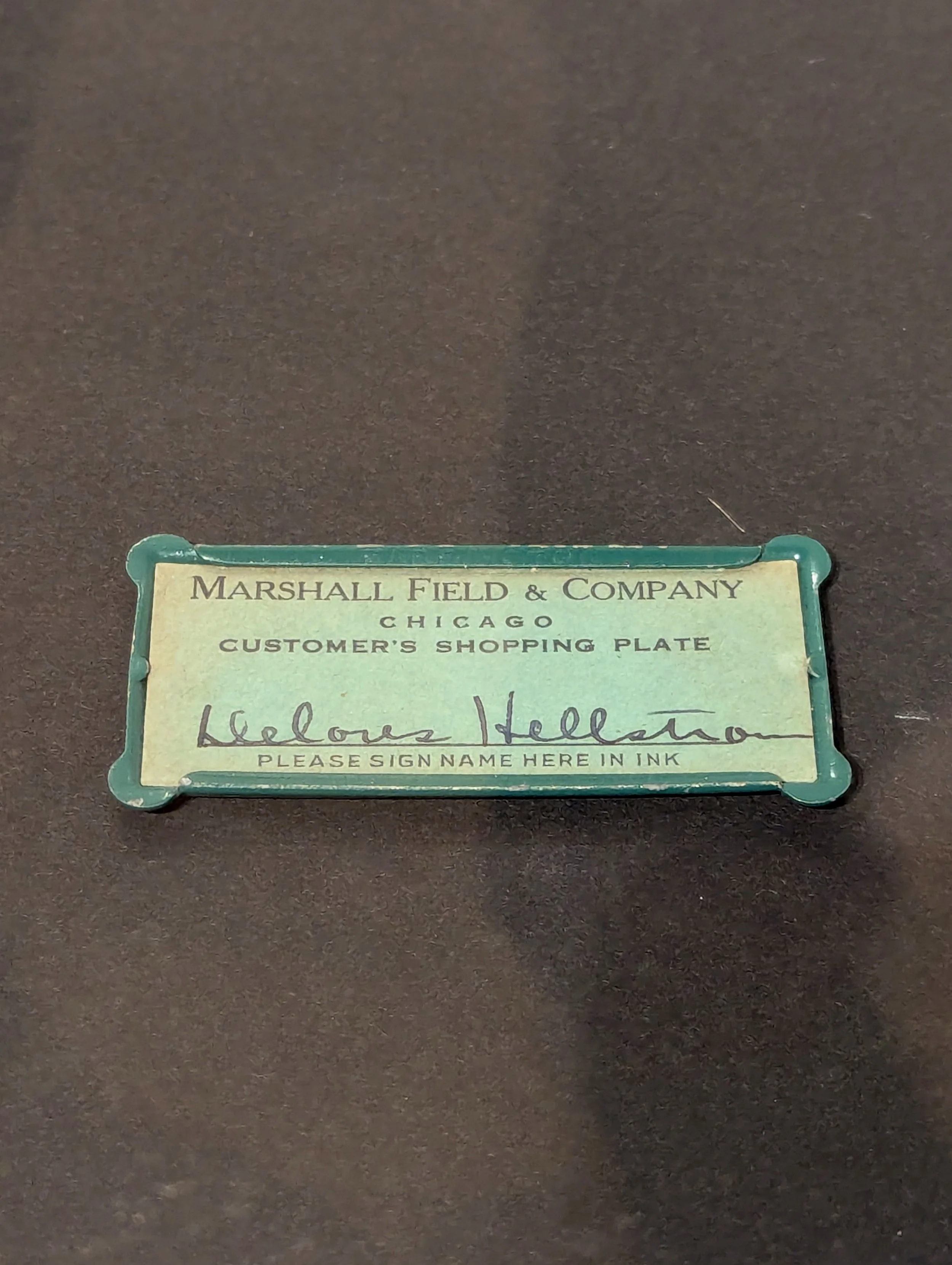 CUSTOMER’S SHOPPING PLATE Marshall Field &amp; Company, Chicago, with address embossed verso: 1612 Juneway Terrace, Chicago signed Delores Hellstrom, date unknown 