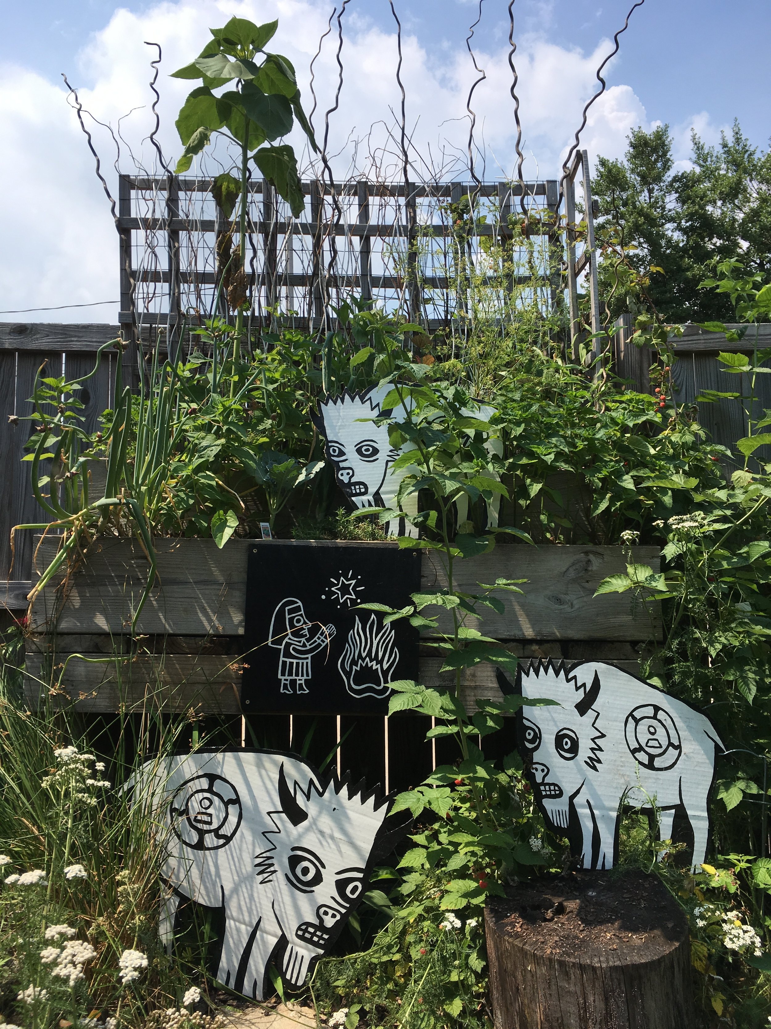 White Buffalo and Woman by a Fire