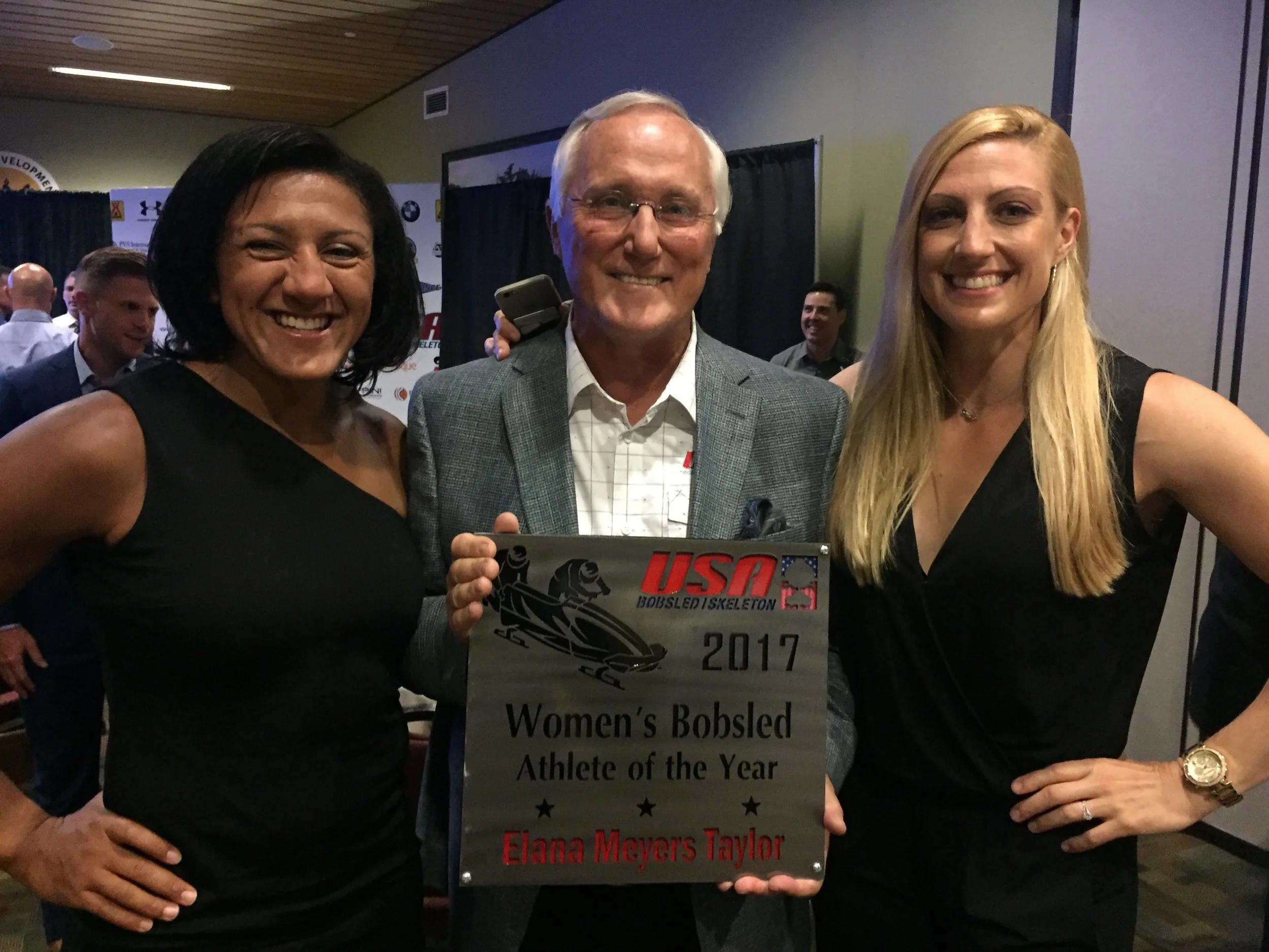 Pete Converse poses with Olympic medalists Elana Meyers-Taylor and Jamie Greubel Poser during the Annual Gala Awards in Lake Placid, NY.