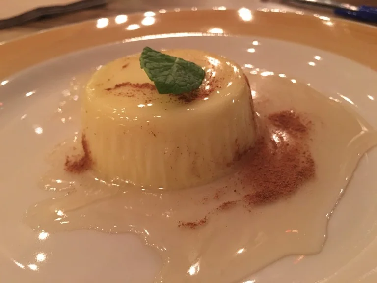 Flan drenched with Mezcal tequila-infused honey and adorned with cinnamon and mint. Photo by Rachael Worthington.