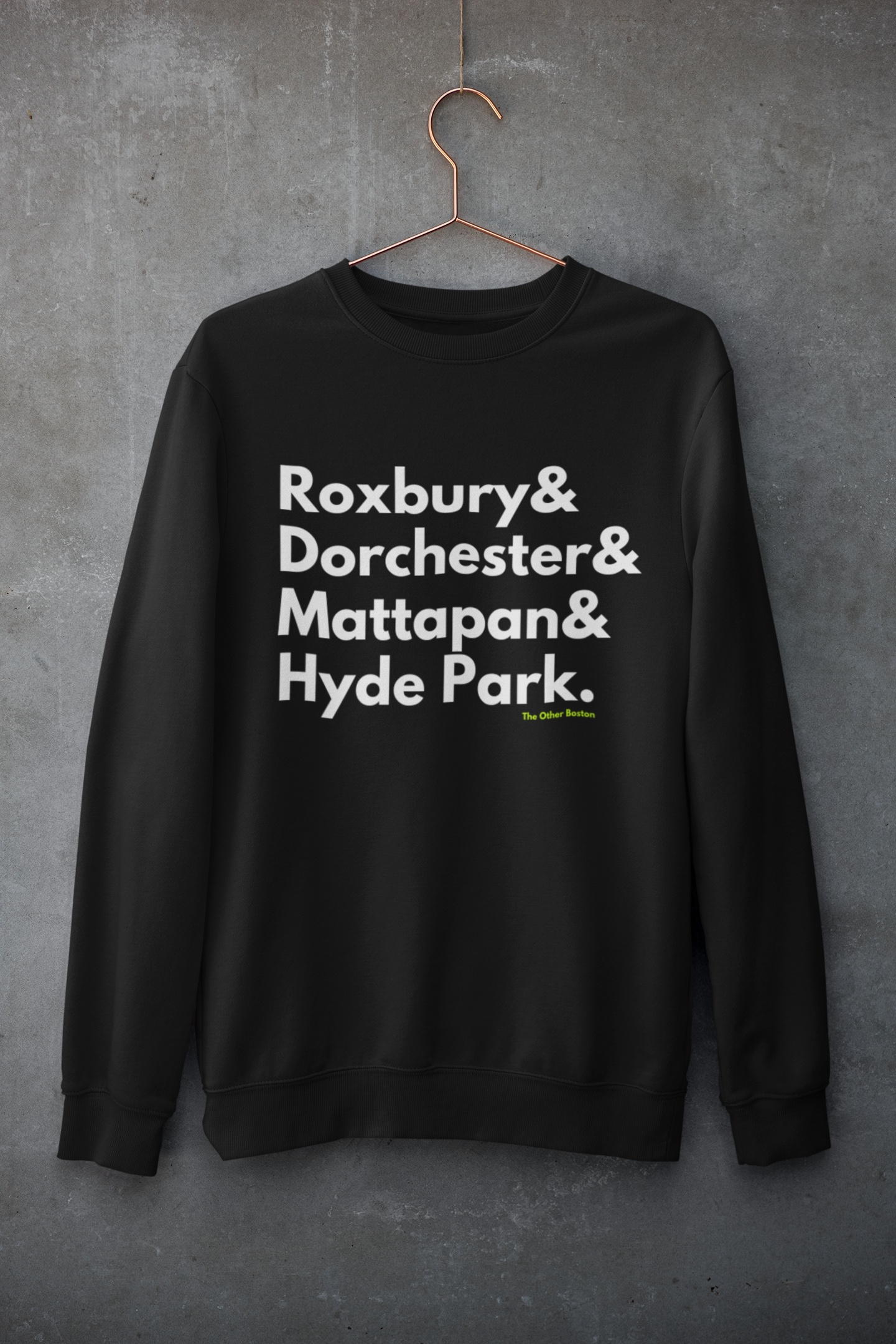 mockup-of-a-customizable-crewneck-sweatshirt-hanging-against-a-concrete-wall-33997.png
