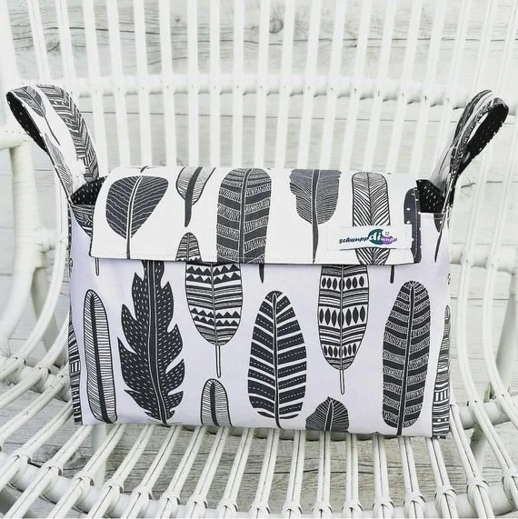 pram caddy del white with black leaves.jpg
