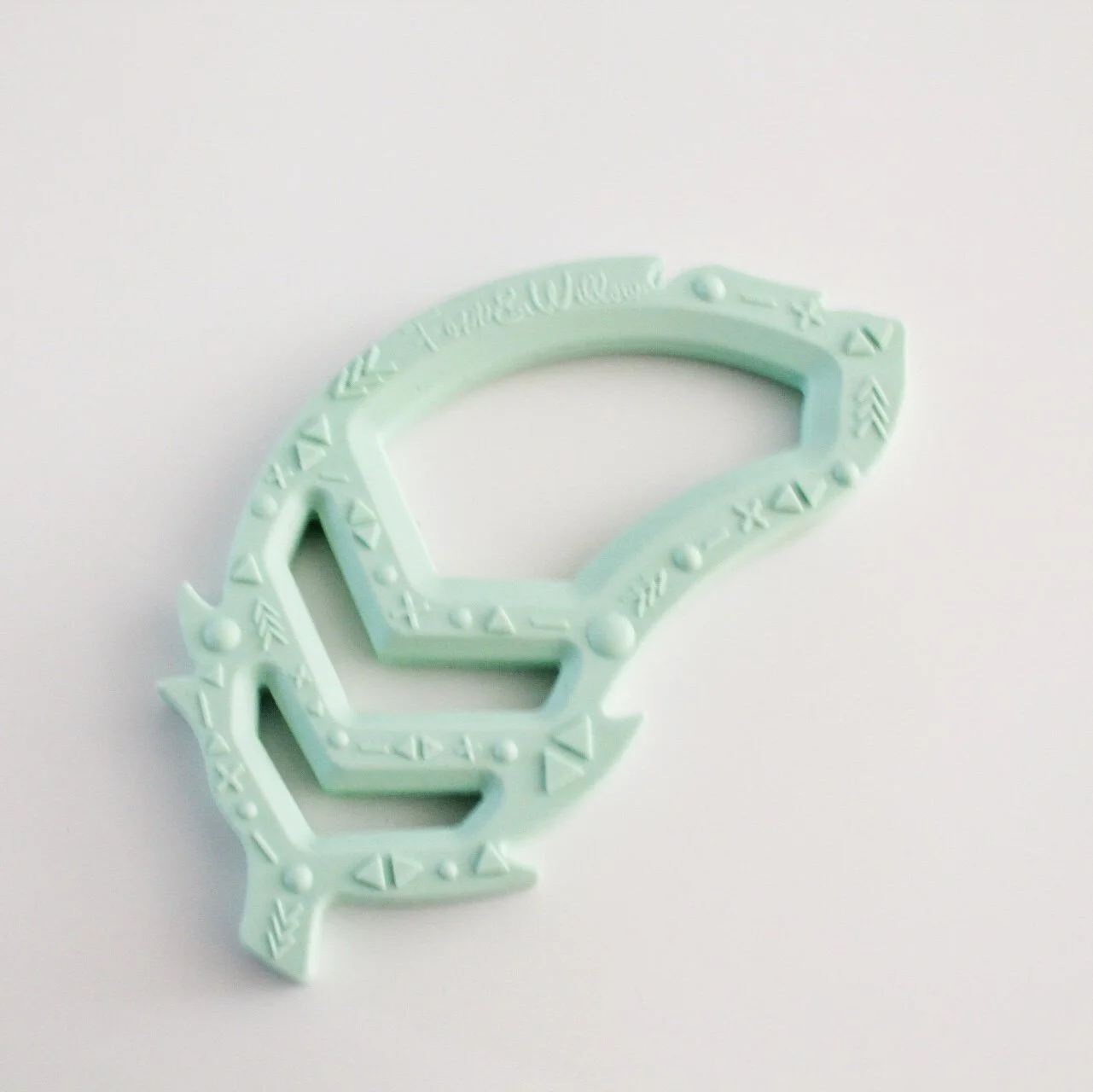 teether feather mint.jpg