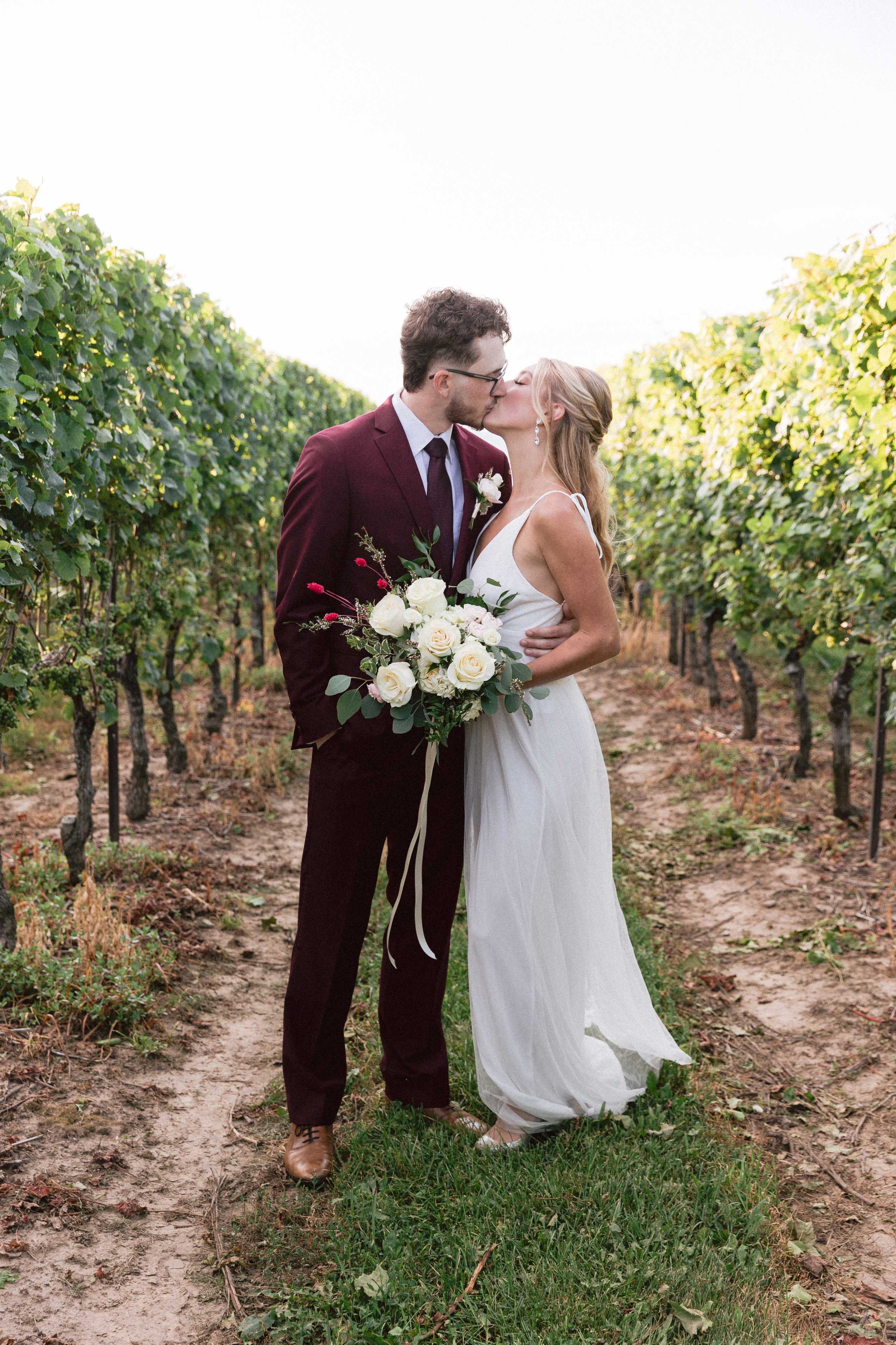 Wedding couple in the vineyards at Konzelmann Winery
Photo by Ether Photography