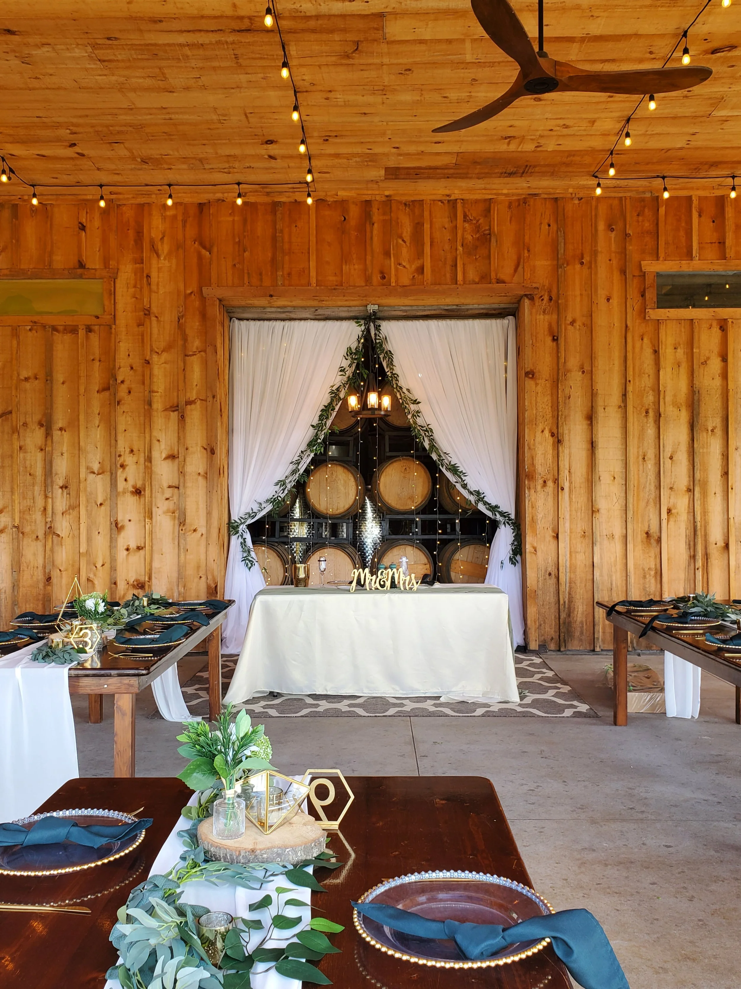 Open draping in front of barrel wall at Calamus