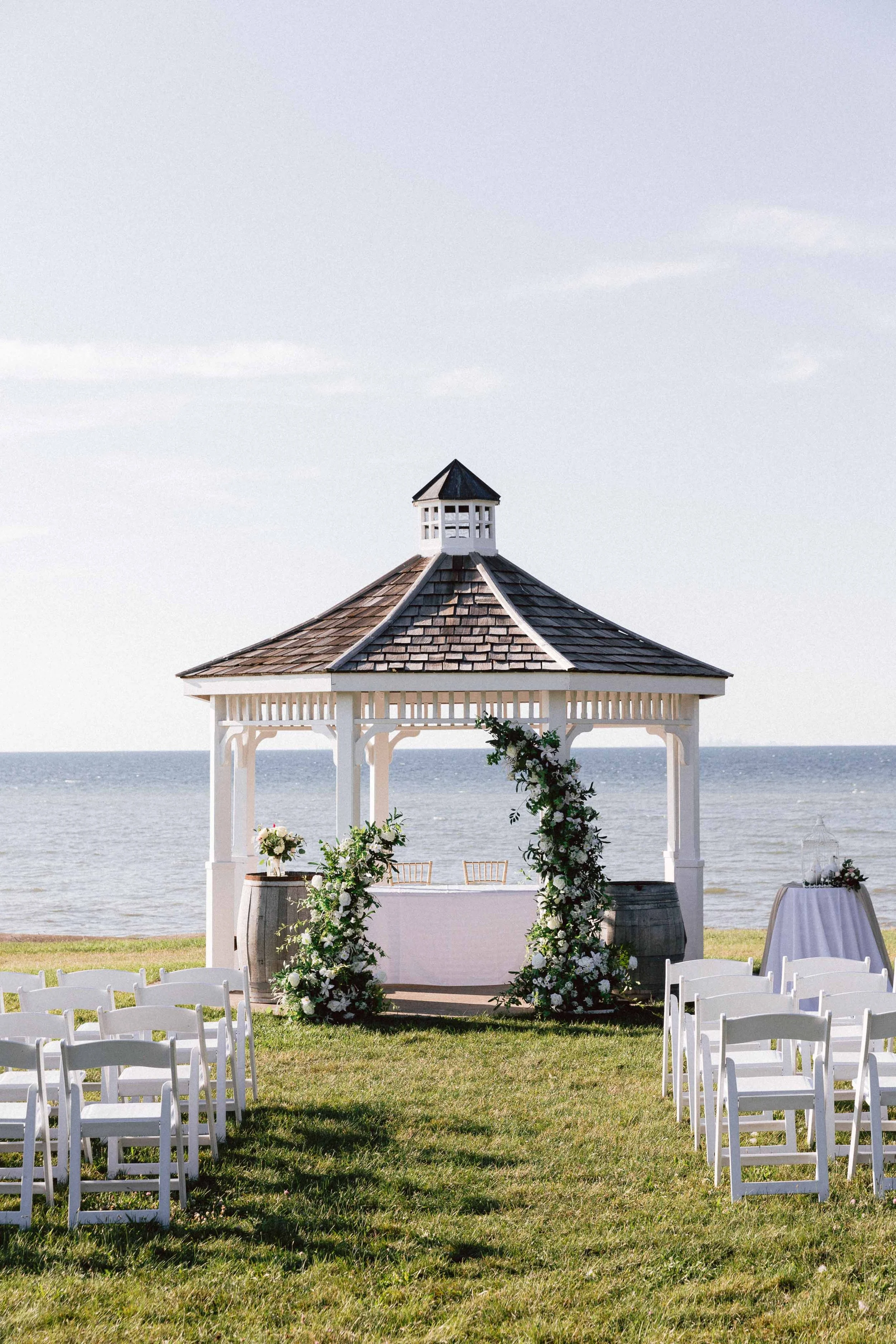 Deconstructed arch in front of the lakeview gazebo for an outdoor ceremony at Konzelmann Winery
Photo by Ether Photography