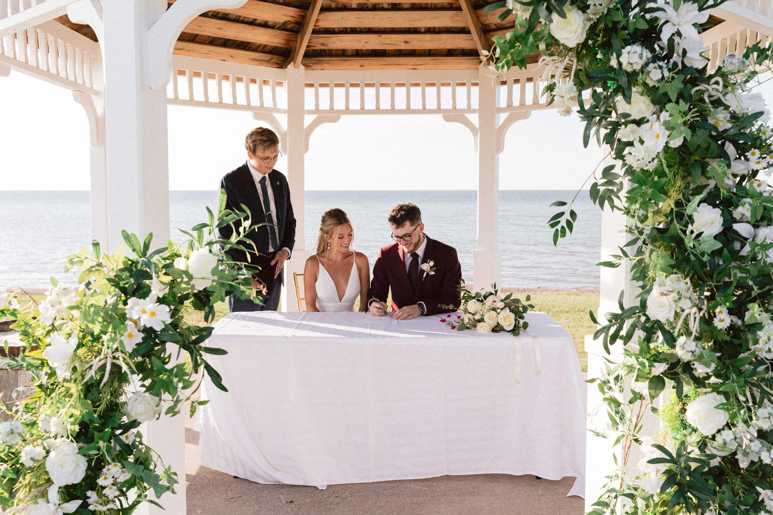Signing at a gazebo ceremony at Konzelmann Estate Winery