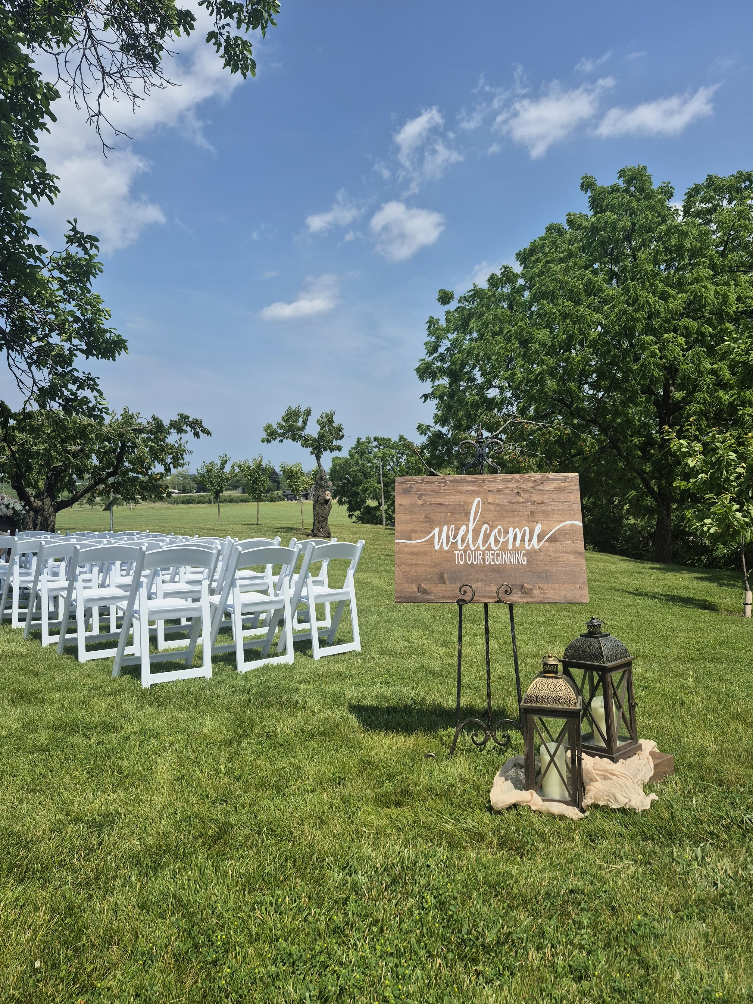 Welcome sign at outdoor ceremony