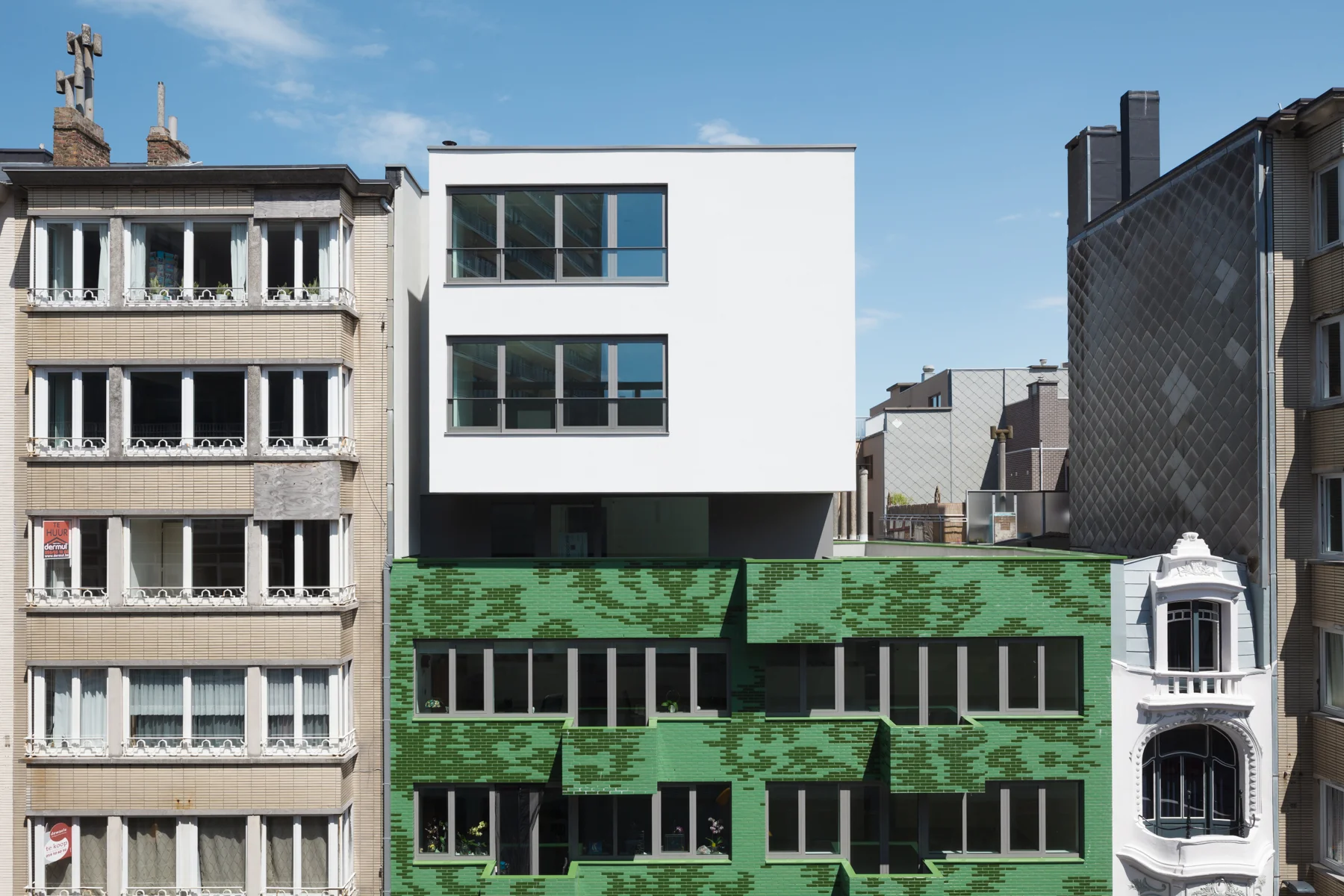 stedelijk ensemble, renovatie historisch pand - nieuwbouw woonproject met handelsruimte - Oostende