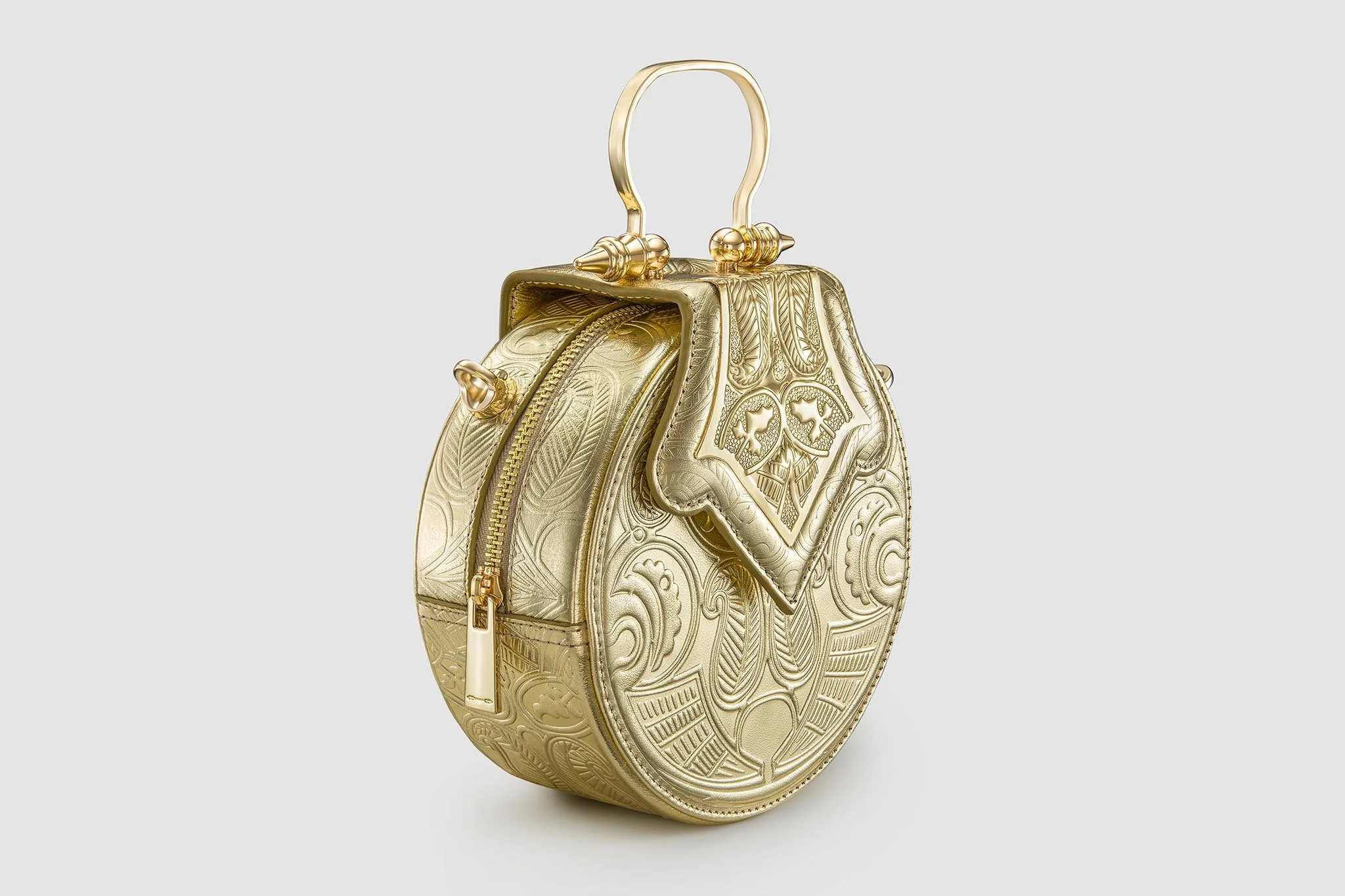 okhtein-mini-dome-embossed-three-quarter-view-luxury-handbag-product-photography-egypt.jpg