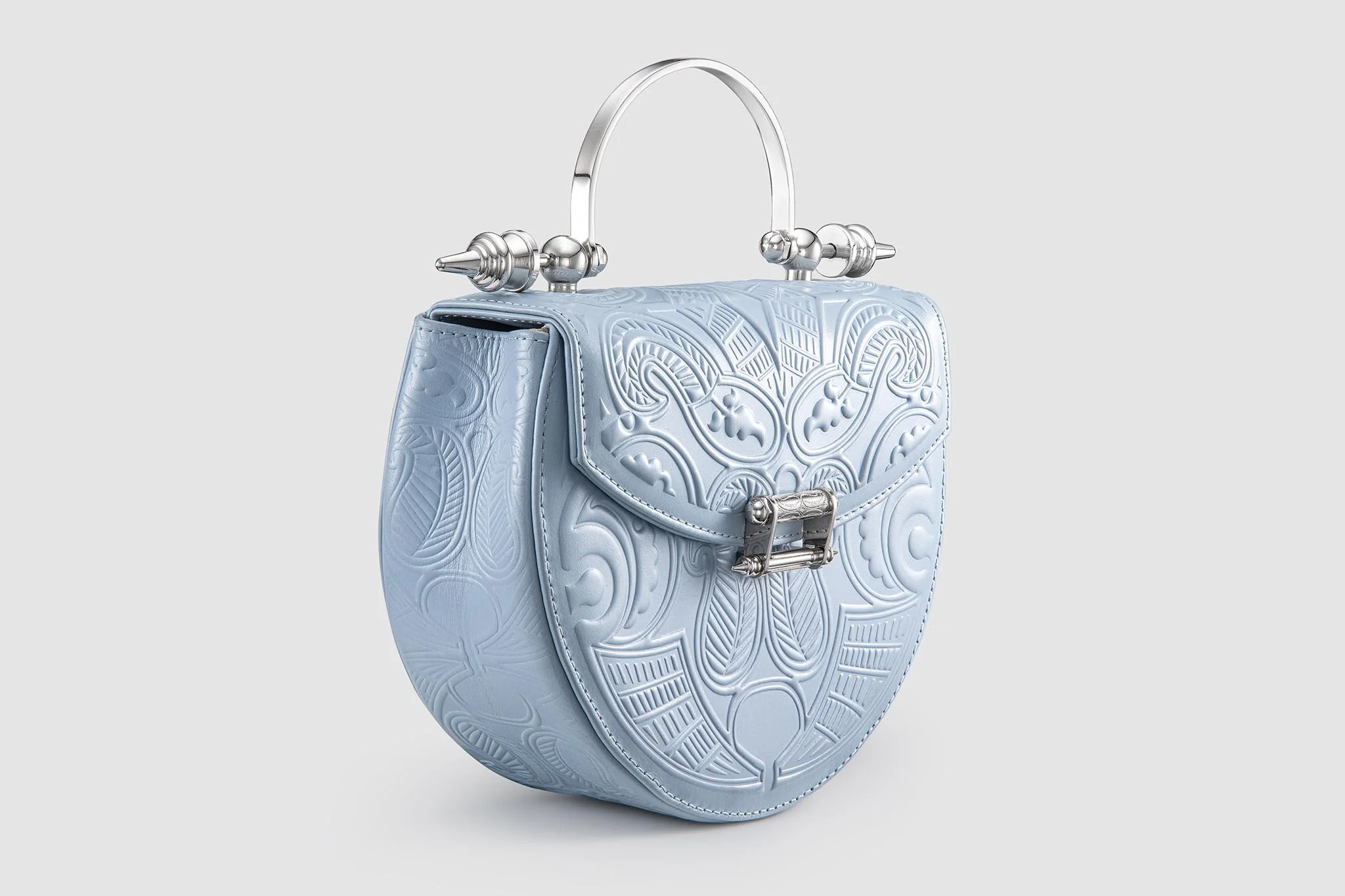 okhtein-oak-on-leather-angle-light-blue-embossed-leather-luxury-handbag-product-photography-egypt.jpg