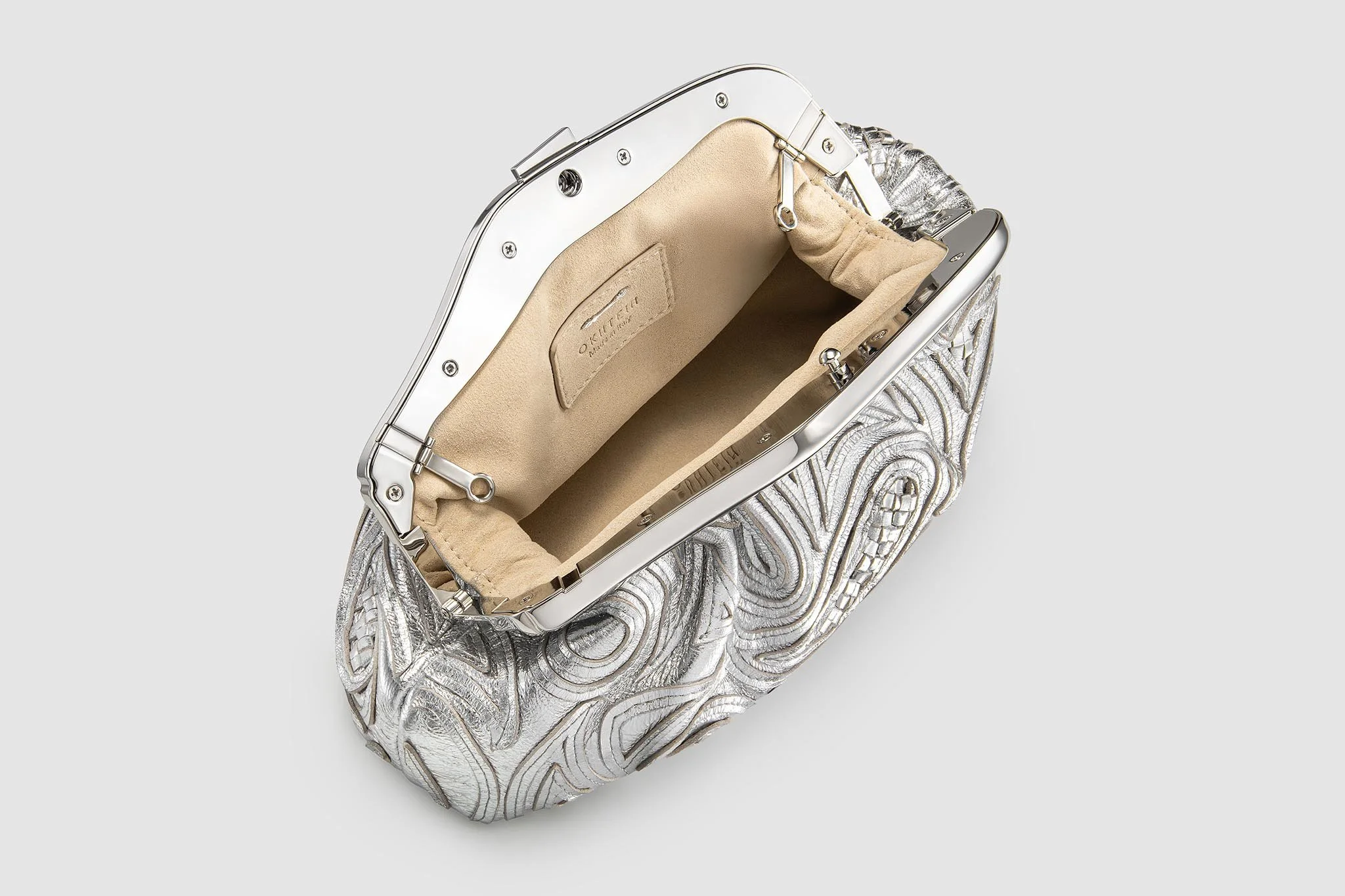 okhtein-malleable-clutch-silver-open-product-photographer-in-egypt.jpg